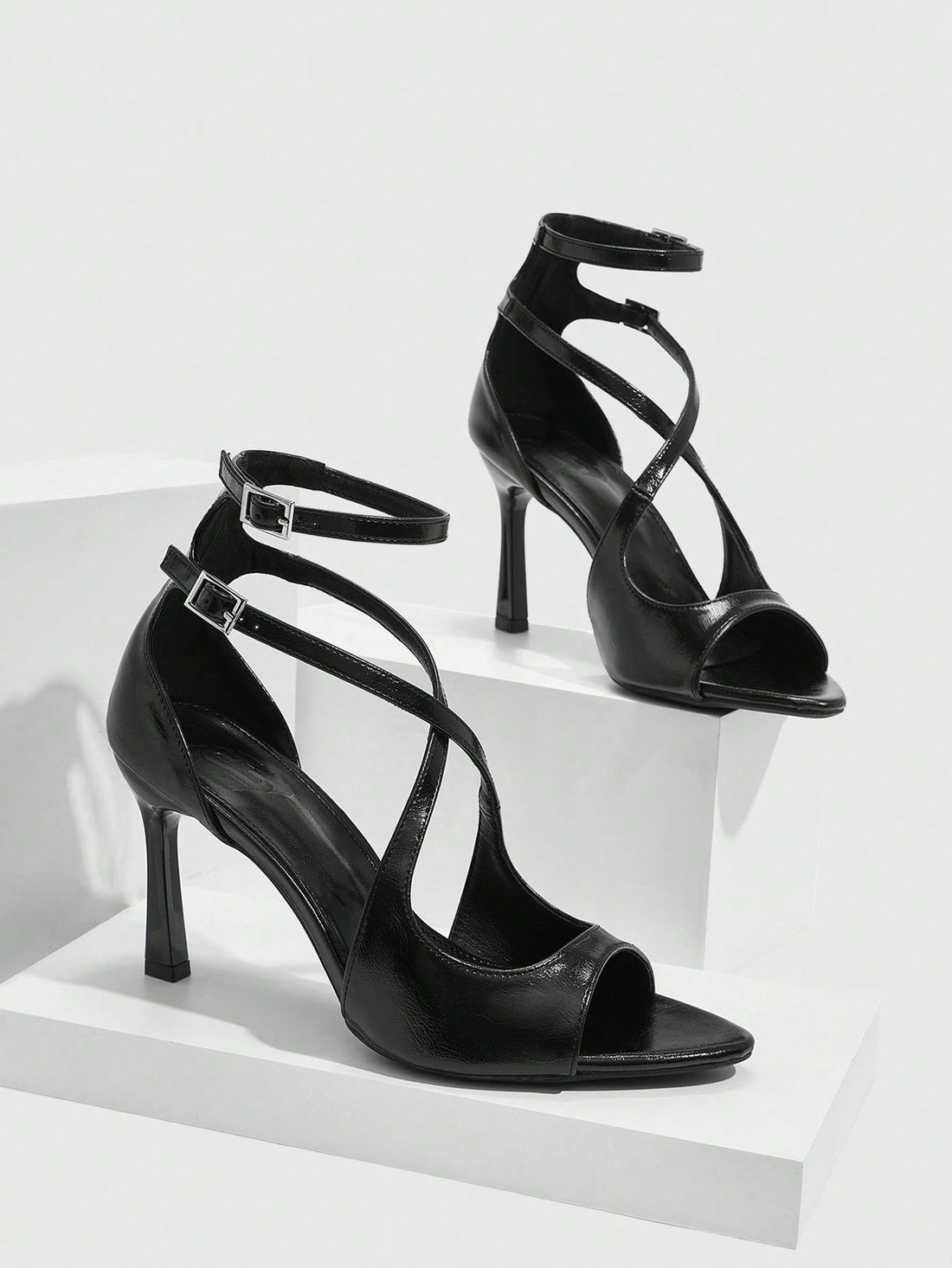 Step into the season with these stunning peep-toe criss-cross heeled sandals that blend style with everyday wearability. The interlocking straps create a chic silhouette while the modest heel offers just the right lift for comfort during your commute or holiday gatherings. Whether you're dashing between meetings or celebrating with friends, these versatile beauties transition seamlessly from day to night. The peep-toe design adds a flirty touch that works with everything from casual dresses to polished work