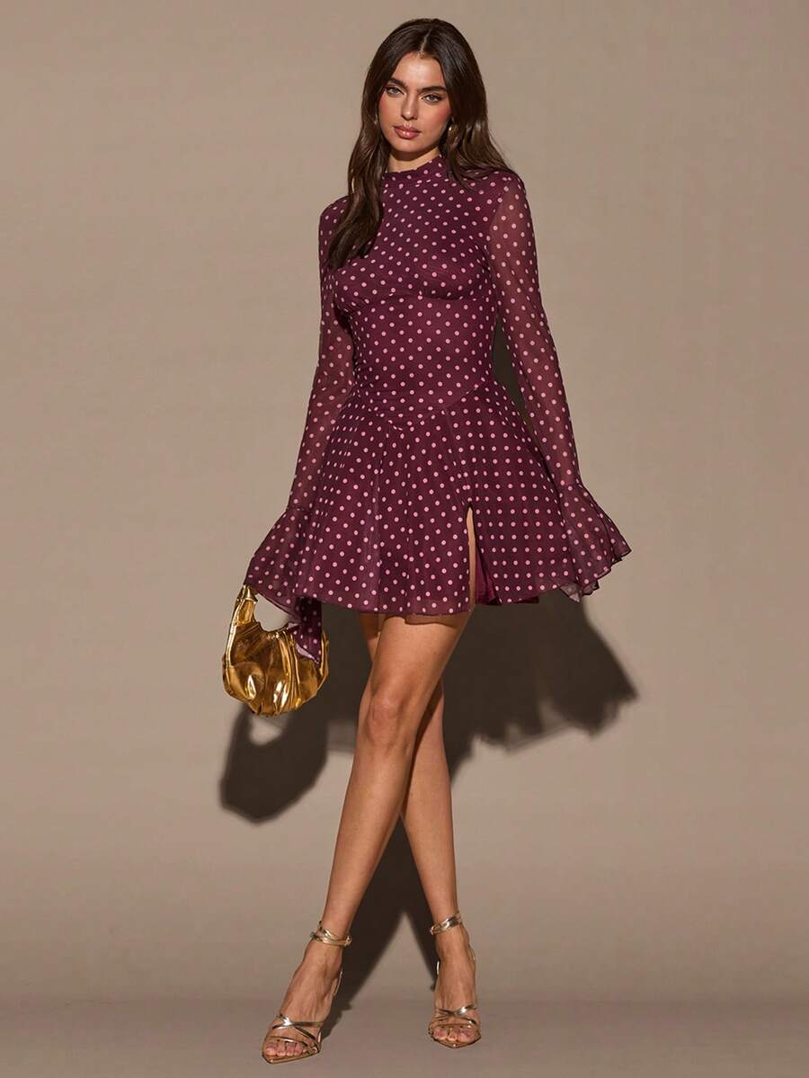 Elevate your everyday style with this Chic Polka Dot Print Mini Dress, designed for women who love timeless elegance with a modern twist. Featuring a classic polka dot pattern, a sophisticated slit collar neckline, and graceful long sleeves, this dress creates a polished yet effortlessly feminine look.