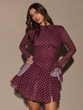 Elevate your everyday style with this Chic Polka Dot Print Mini Dress, designed for women who love timeless elegance with a modern twist. Featuring a classic polka dot pattern, a sophisticated slit collar neckline, and graceful long sleeves, this dress creates a polished yet effortlessly feminine look.