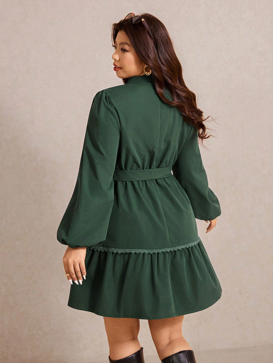 Effortlessly chic and oh-so-comfortable, this plus-size dress is your new go-to for looking put-together without trying too hard. The playful knotted waist detail cinches your silhouette while the relaxed long sleeves keep things casual and cool. Perfect for running errands, coffee dates, or just feeling fabulous in your everyday life. Slip it on and let the dress do the work—because style should always feel this easy and fun!