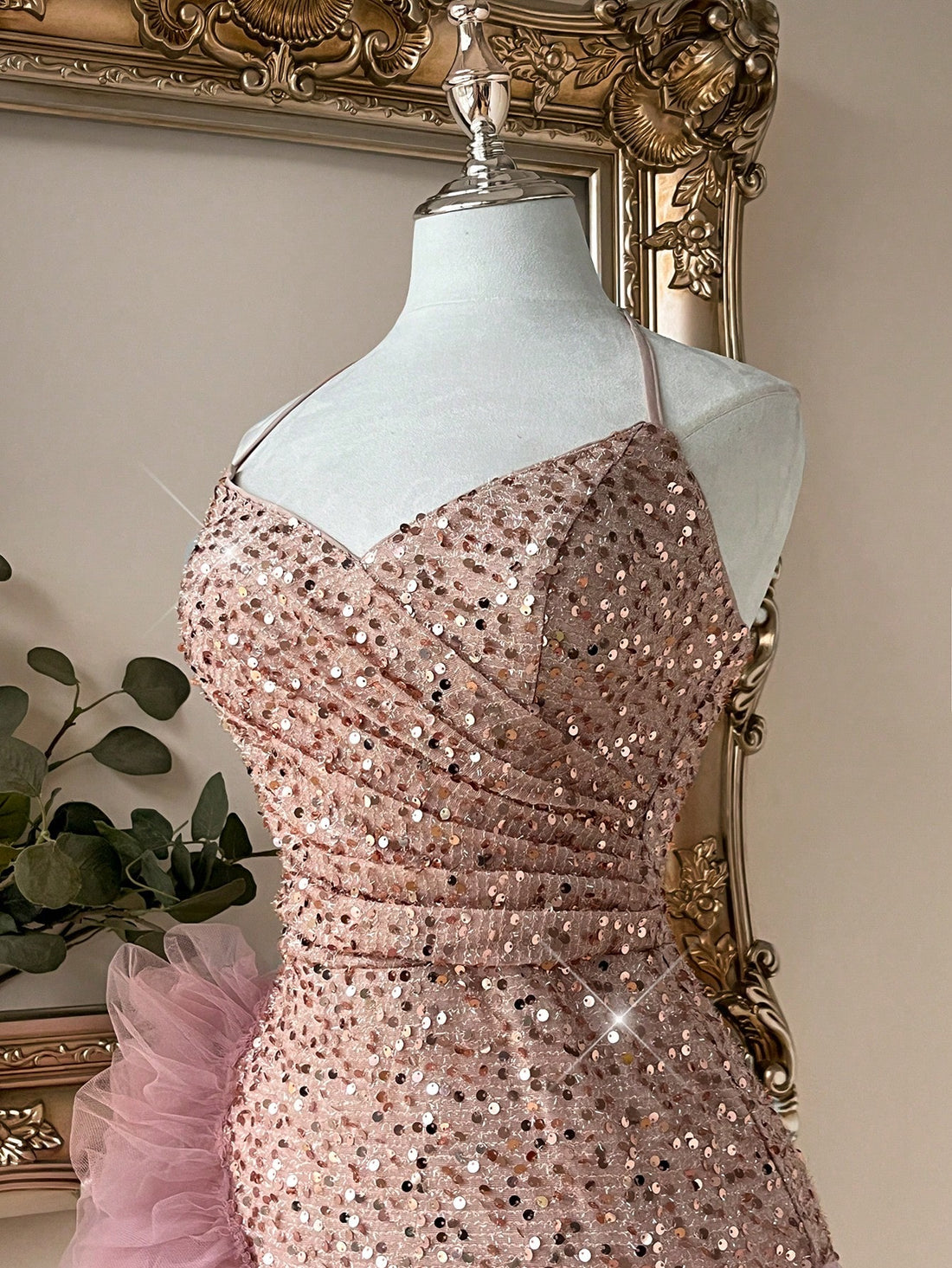 Elevate your event look with this stunning chic pink sequin halter party dress. Crafted from shimmering sequins, this mini dress features a flattering slim fit with delicate spaghetti straps and a charming halter neckline. The ruffle and cup details add romantic flair, while the fully lined construction ensures comfort and confidence. Perfect for weddings, formal occasions, and photoshoots, this baby pink beauty combines sparkle with sophistication.