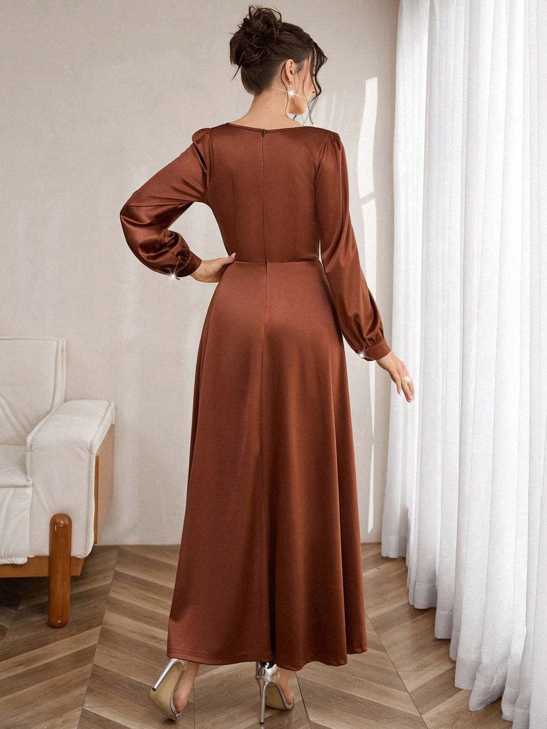 Step into timeless elegance with this stunning A-line satin dress, where vintage charm meets modern sophistication. The delicate studded pearl embellishments add a touch of glamour, while the charming lantern sleeves create a flattering, romantic silhouette. Perfect for fall gatherings and spring celebrations, this dress transitions effortlessly from day to night. The flowing satin fabric drapes beautifully, ensuring you'll feel as fabulous as you look. Whether you're heading to a special occasion or turnin