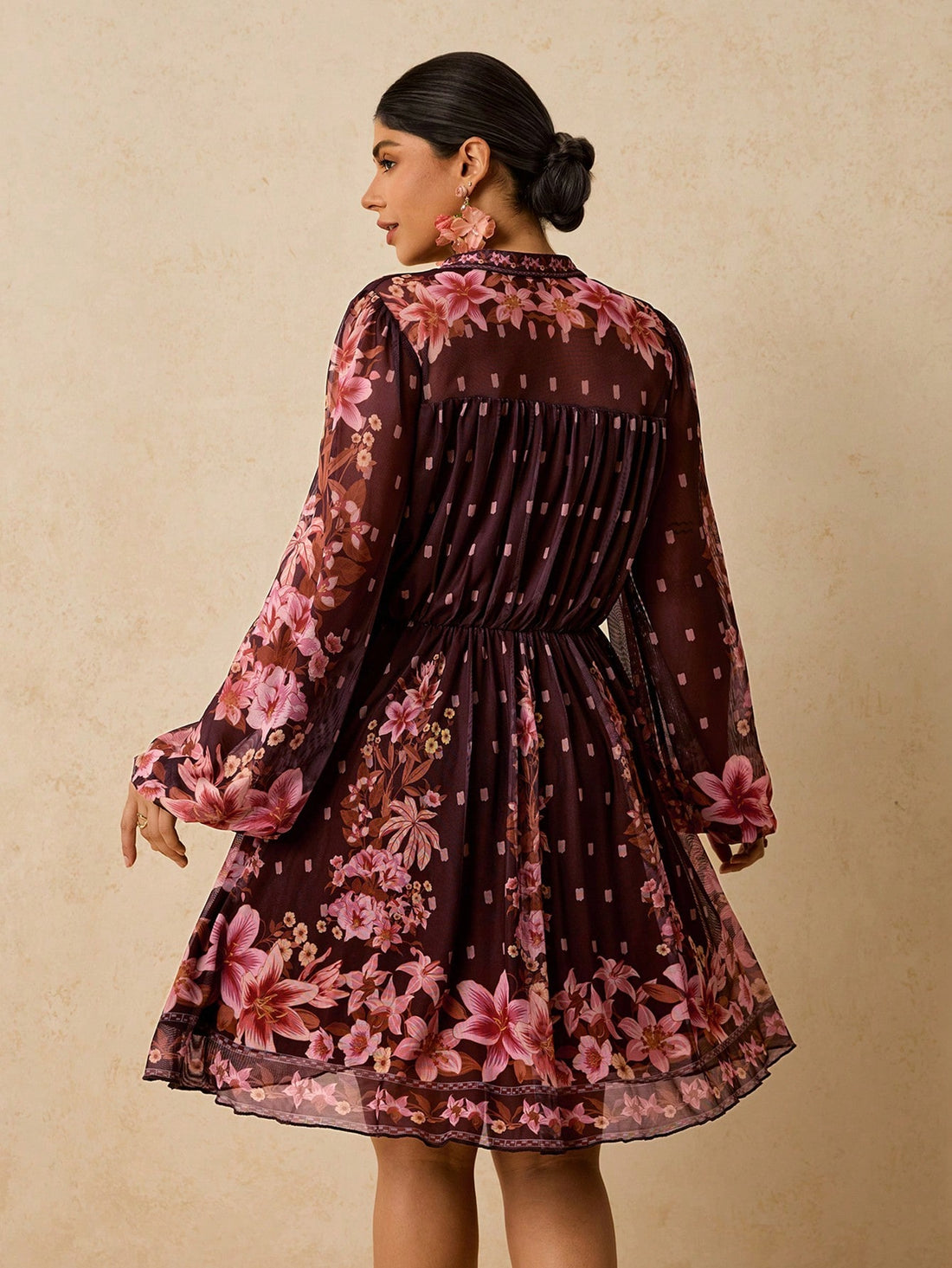 Step into the spotlight with this stunning plus-size floral print mini dress that proves elegance has no size limit. The rich brown knit fabric drapes beautifully while the vibrant floral design adds a pop of personality to any gathering. Perfect for parties, date nights, or whenever you want to feel fabulous, this dress combines comfort with undeniable style. The flattering fit celebrates your curves while the playful print keeps things fun and fresh. Whether you're dancing the night away or mingling with 