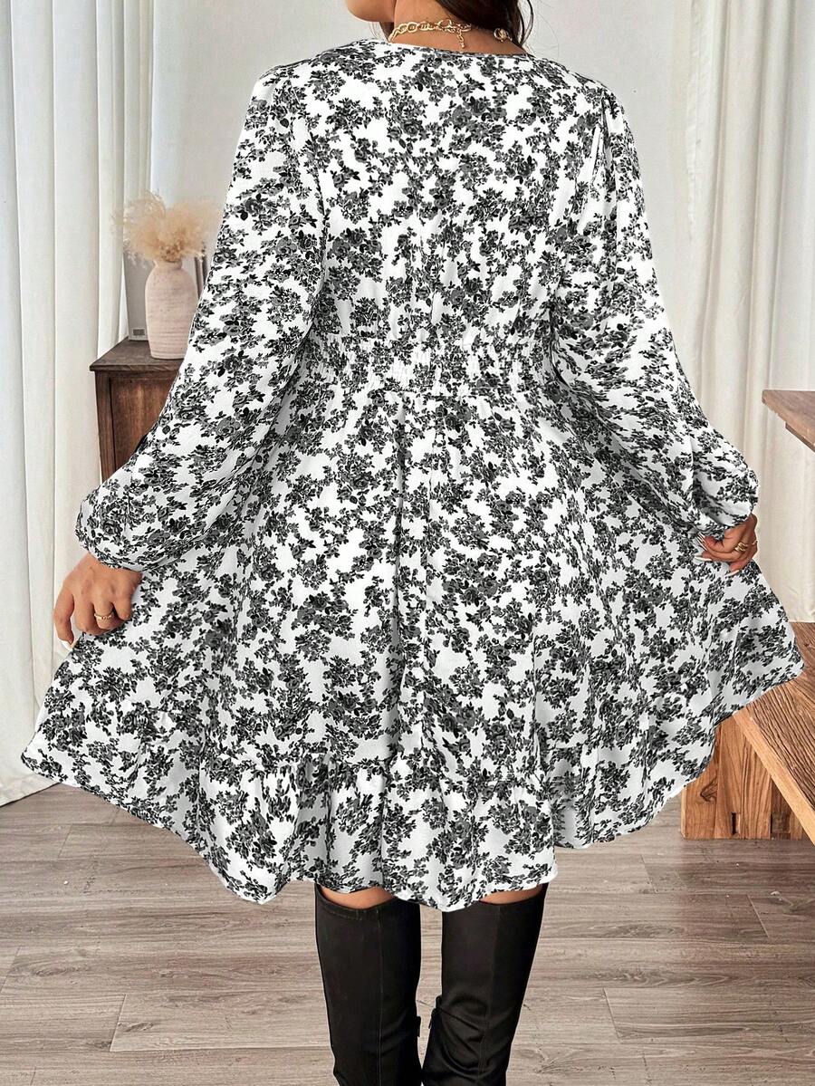 Embrace effortless elegance with this charming plus-size dress, featuring delicate ditsy florals that dance across the fabric. The romantic lace-trimmed neckline and voluminous lantern sleeves add a whimsical touch perfect for autumn adventures, beach getaways, and festive celebrations. Designed to flatter and comfort, this versatile piece transitions seamlessly from casual daytime wear to evening occasions. Whether you're strolling seaside or celebrating the holidays, this dress brings playful sophisticati