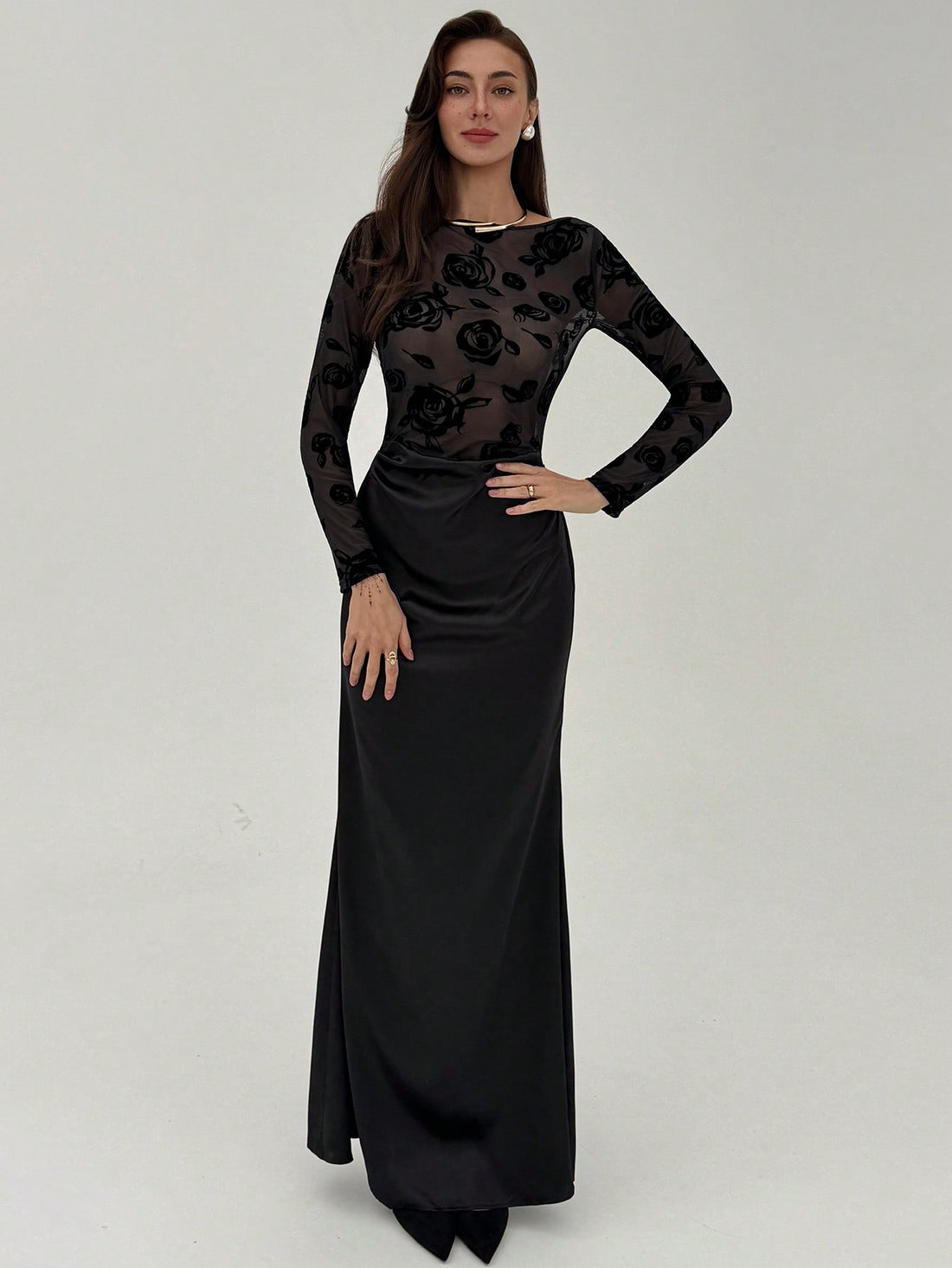 Make a statement at your next wedding with this stunning floral print sheer dress. The delicate long sleeves and flowing silhouette strike the perfect balance between elegance and allure, while the intricate floral pattern adds a touch of romance. Designed for the modern guest who refuses to blend into the background, this chic piece pairs beautifully with heels and minimal jewelry for an effortlessly sophisticated look. Turn heads and feel fabulous in a dress that's as fun as it is fashionable.