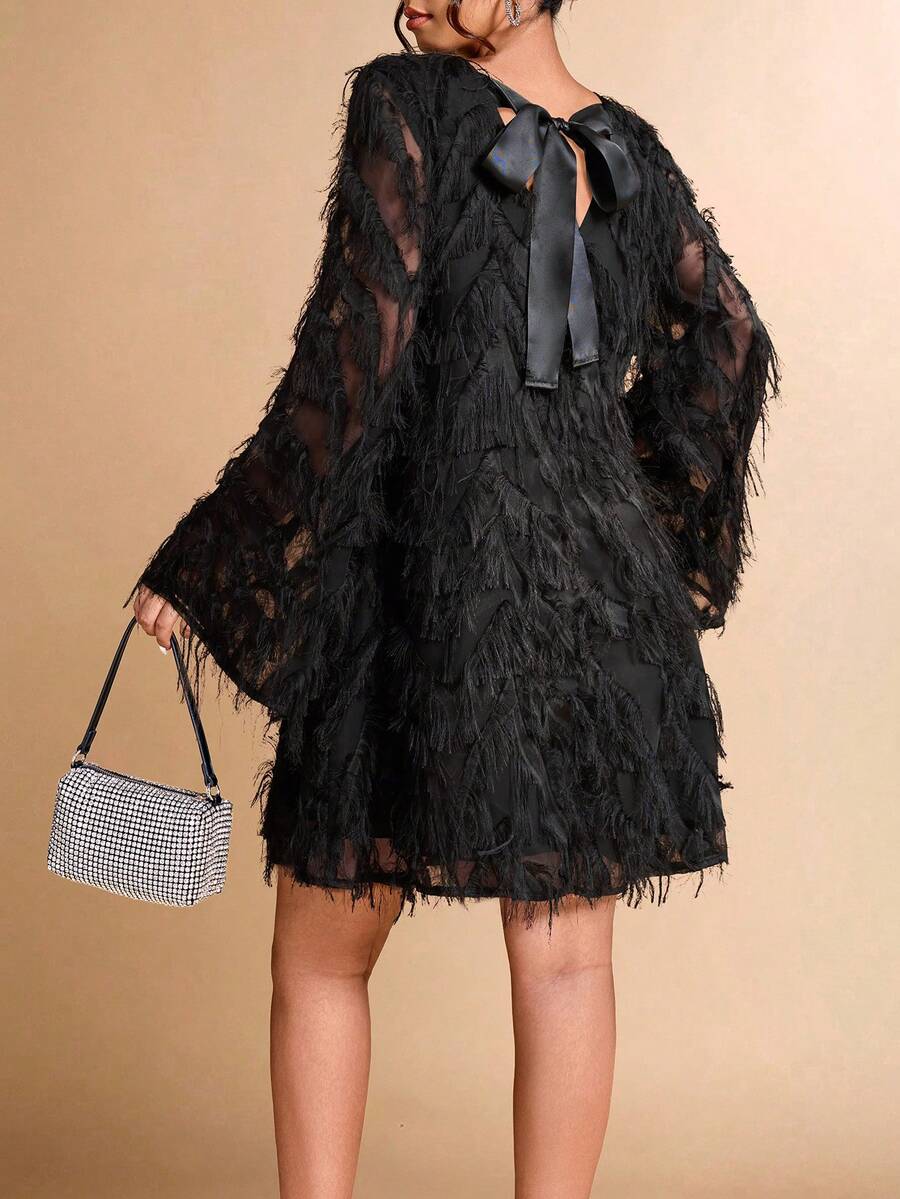 Experience the breathtaking fusion of heritage ethereal artistry and sharp, modern architectural tailoring. This stunning tassel-accented ensemble is meticulously designed for the woman who values a high-fashion, "quiet luxury" approach to seasonal dressing—the ultimate centerpiece for prestigious coastal retreats, exclusive evening soirées, and high-authority summer celebrations.