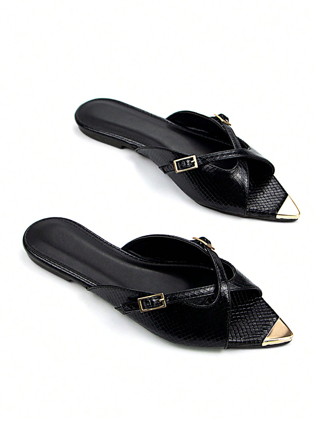 Step into sophistication with these stunning black snake skin mule sandals that effortlessly transition from casual days to glamorous nights. The luxe textured finish catches the light beautifully, while the gleaming gold buckle detail adds that perfect touch of polish. Designed as a flat, they're all about comfort without compromising on style—slip them on and feel instantly put-together. Whether you're running errands or heading to a soirée, these versatile mules are your new go-to pair for looking fabulo