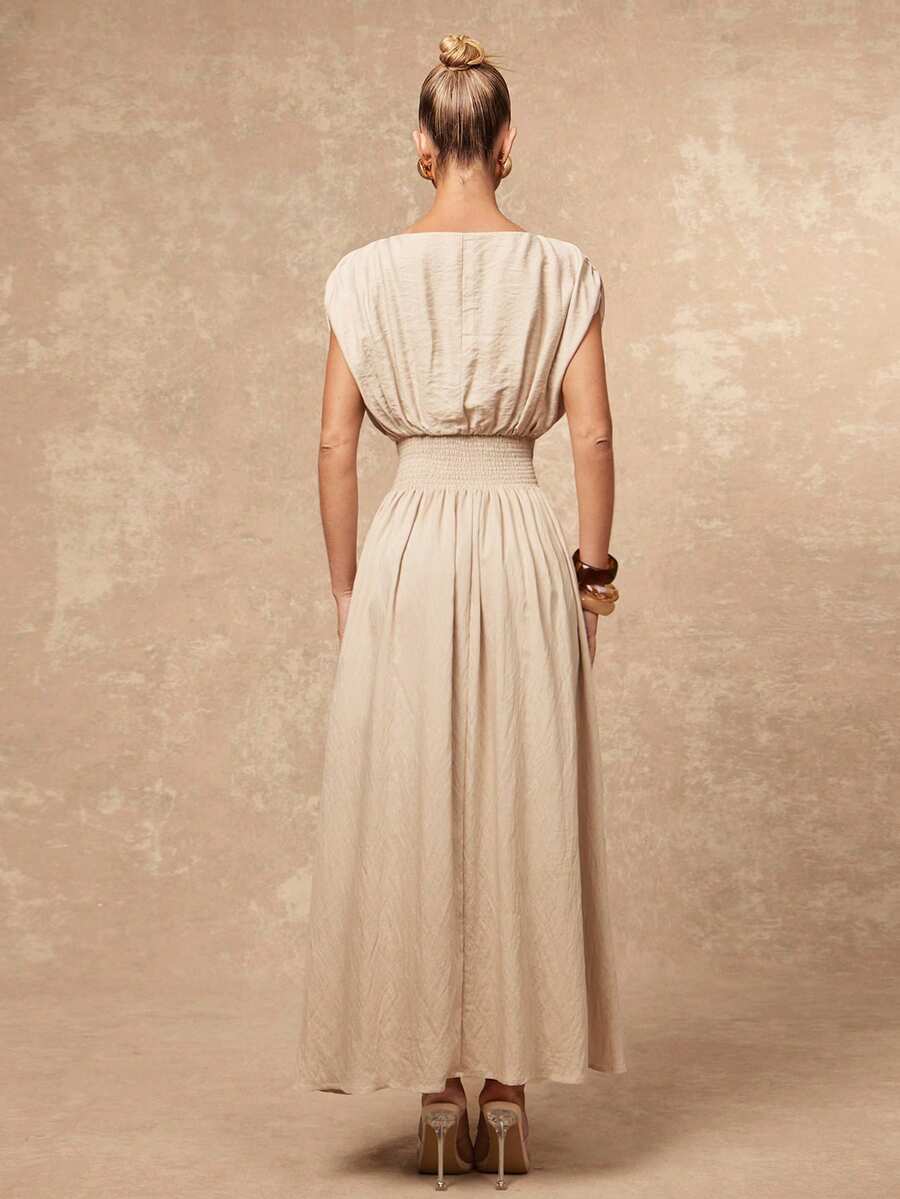 Elevate your summer wardrobe with this sophisticated oversized boat neck dress. Crafted from a luxurious viscose-polyamide blend, this A-line silhouette features elegant ruching details and a flattering high waist that creates a graceful, flowing shape. The sleeveless batwing design and lined construction offer both comfort and style, making it an ideal choice for vacations, evening events, and special celebrations. Available in a versatile khaki tone, this dress transitions effortlessly from day to night. 