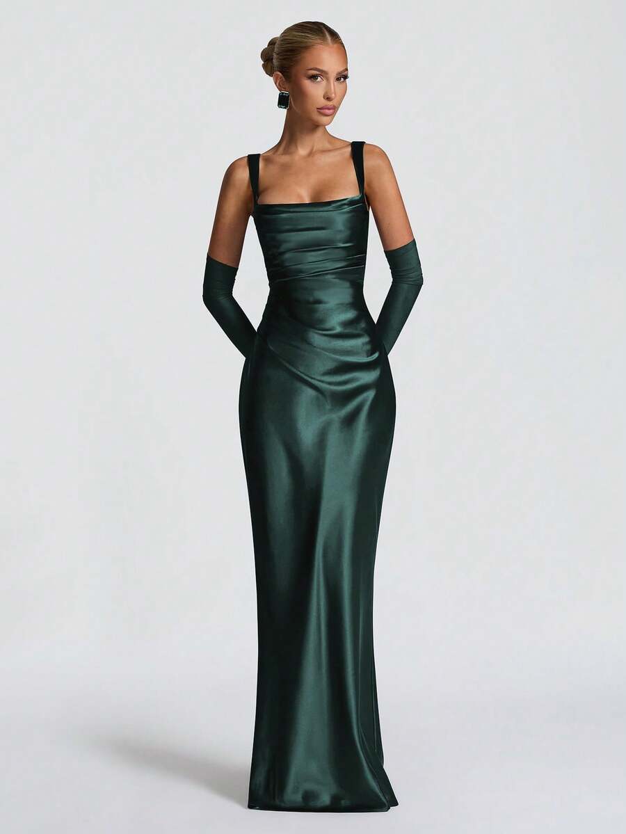 Rear view of plum satin gown showing adjustable straps and lace-up back panel
