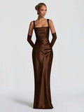 Full-length front view of brown satin evening gown with square neckline and matching gloves