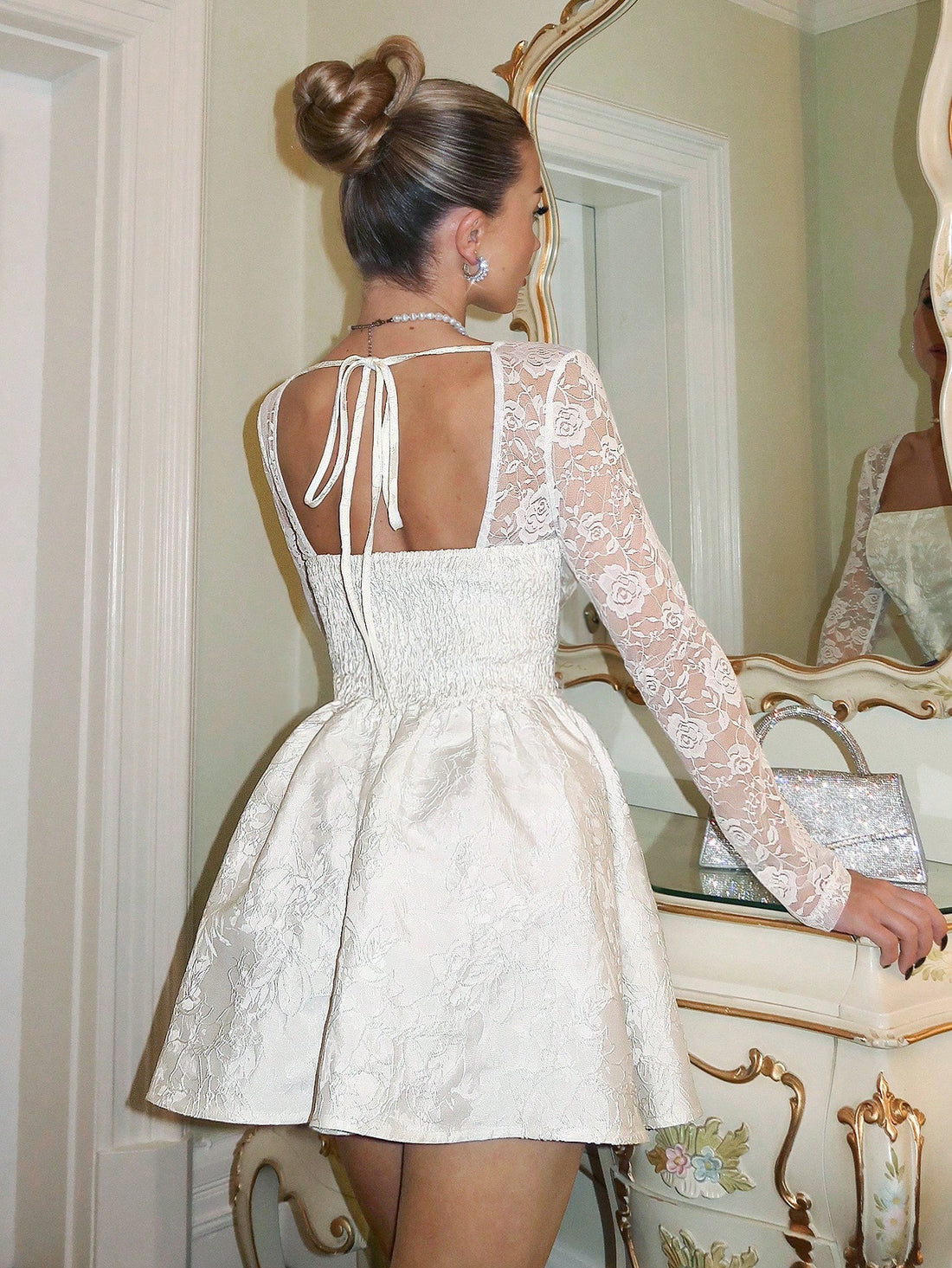 Step into sophistication with this charming white A-line dress, where delicate 3D floral lace creates an enchanting texture that catches every eye. Perfect for tea parties, garden gatherings, and special occasions, this dress combines timeless elegance with a modern twist. The flattering A-line silhouette skims gracefully over the body, while the intricate lace detailing adds a touch of whimsy and romance. Whether you're sipping tea with friends or celebrating life's sweet moments, this dress is your ticket