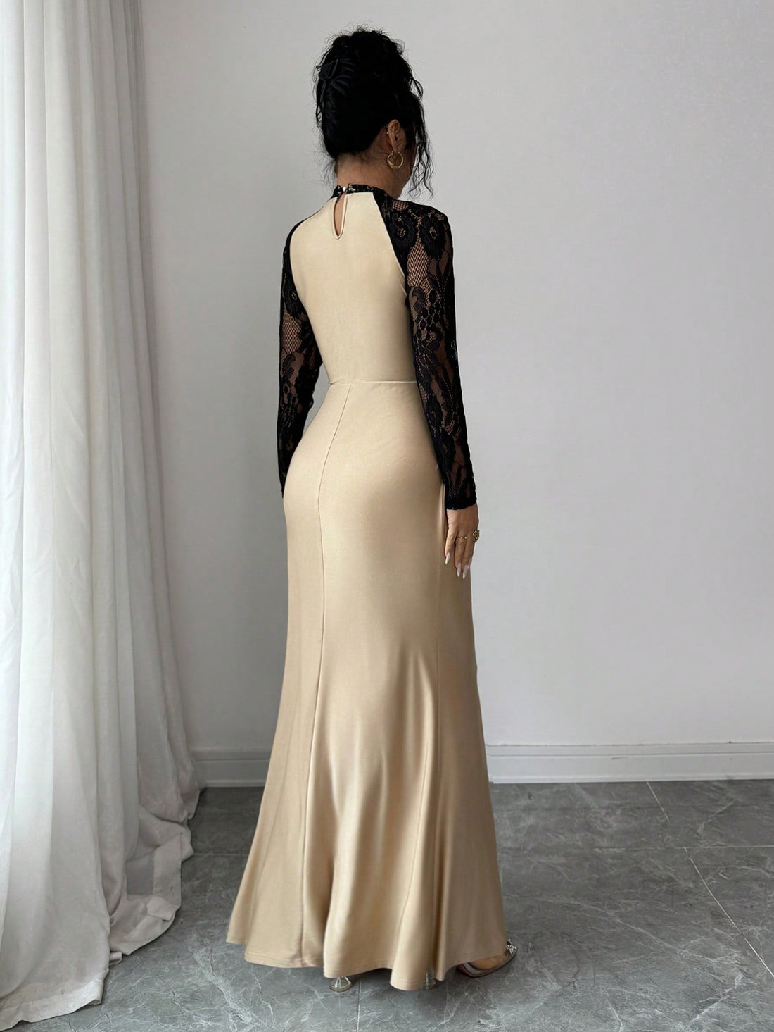 Turn heads at your next celebration in this stunning black lace fishtail dress. The intricate lace detailing creates an air of sophistication, while the dramatic fishtail silhouette adds a touch of glamour and movement. Perfect for autumn and winter galas, holiday parties, or any special occasion where you want to feel absolutely fabulous. The elegant black hue pairs effortlessly with your favorite heels and accessories, making it a versatile addition to your evening wardrobe. Slip into pure elegance and le