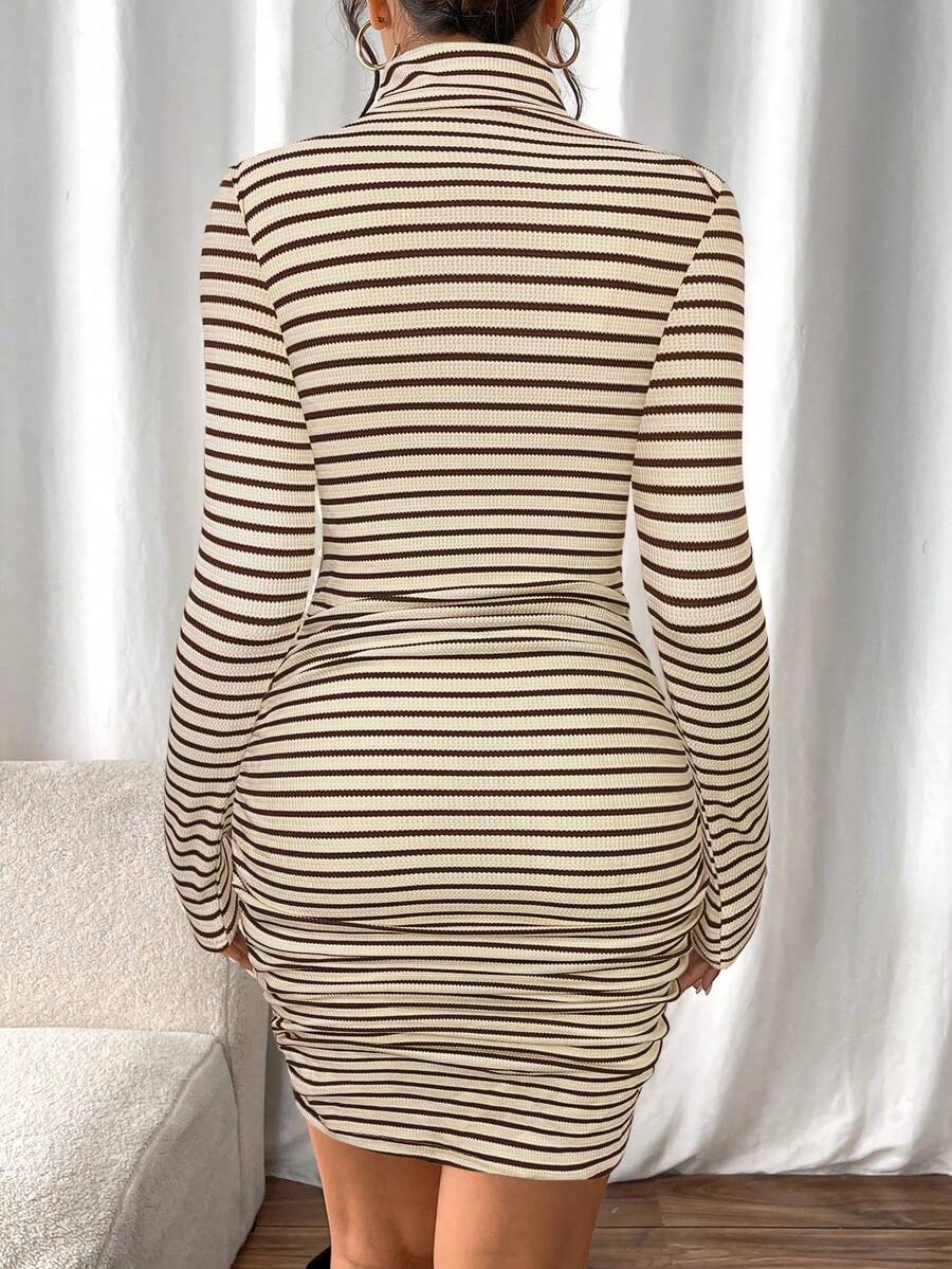 Back view of fitted rib-knit striped mini dress with long sleeves