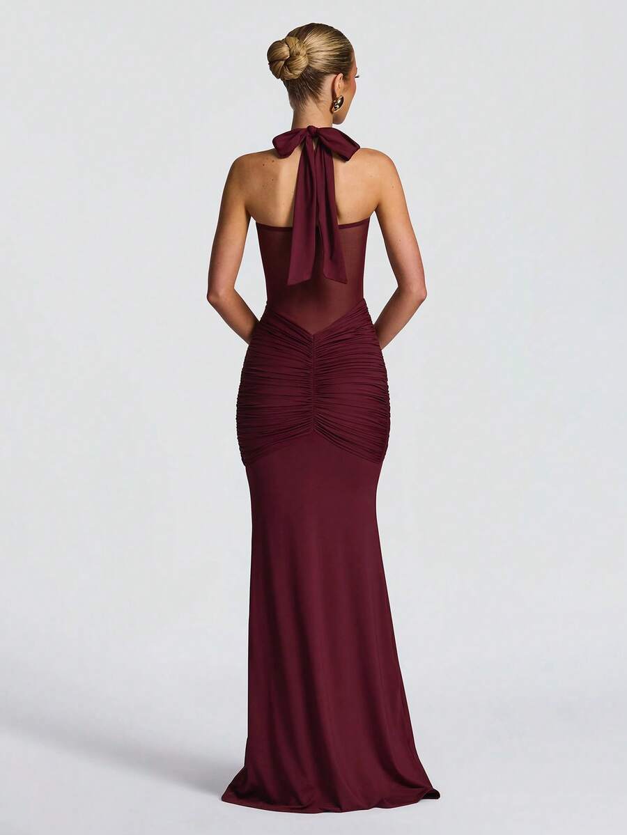 Turn heads wherever you go in this show-stopping backless dress! Delicate spaghetti straps frame your shoulders while the daring open back and thigh-high slit create an irresistibly chic silhouette. Perfect for beach getaways, cocktail parties, or any occasion where you want to feel absolutely fabulous. This elegant piece effortlessly transitions from day to night, giving you that confident, carefree vibe that says you're ready for adventure. Slip it on and let your style do the talking!