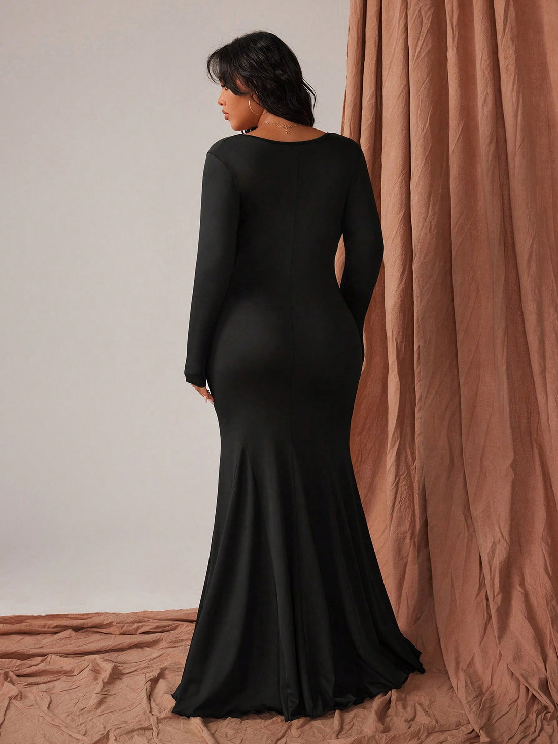 Elevate your evening look with this stunning bodycon maxi dress that's equal parts sophisticated and show-stopping. The flattering V-neckline and cinched waist create an hourglass silhouette, while luxe metal accents add just the right touch of glamour. Crafted from quality polyester, this versatile piece transitions seamlessly from autumn gatherings to winter celebrations. Available in plus sizes, it's designed to make you feel confident, sexy, and absolutely fabulous at any party or special occasion.