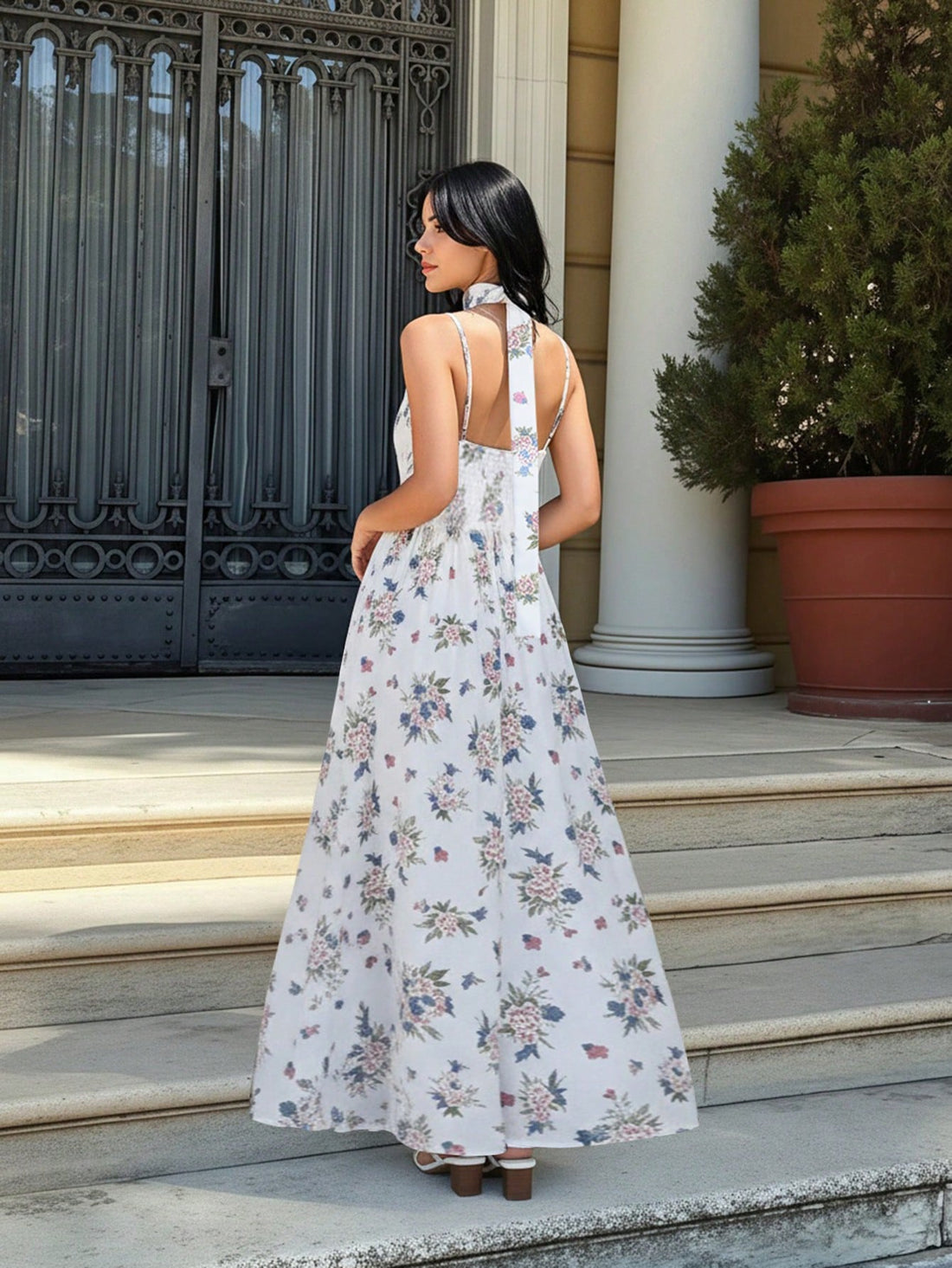 Twirl into effortless elegance with this stunning bohemian maxi dress. Delicate spaghetti straps frame your shoulders while vibrant florals dance across the flowing fabric, creating a romantic silhouette that moves with you. The graceful flared hem adds a playful swish to every step, making it perfect for summer adventures, beach getaways, or those magical golden-hour moments. Slip it on and let your free spirit shine.