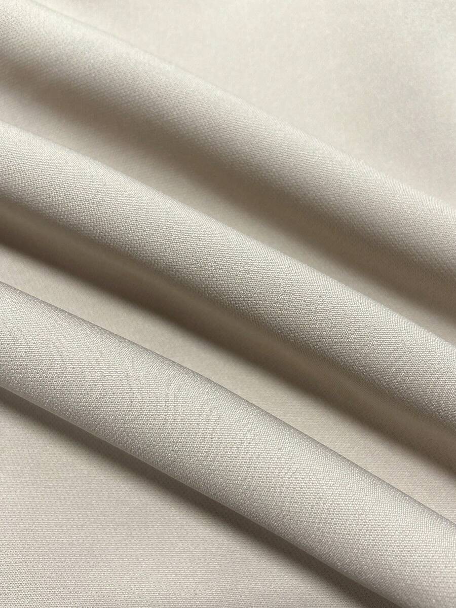 Woven Fabric Close-Up of ivory blazer-style midi dress with black piping for formal work styling