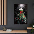 Framed holiday wall art showing a green Christmas tree dress with red bow and snowy black backdrop in a modern dark room
