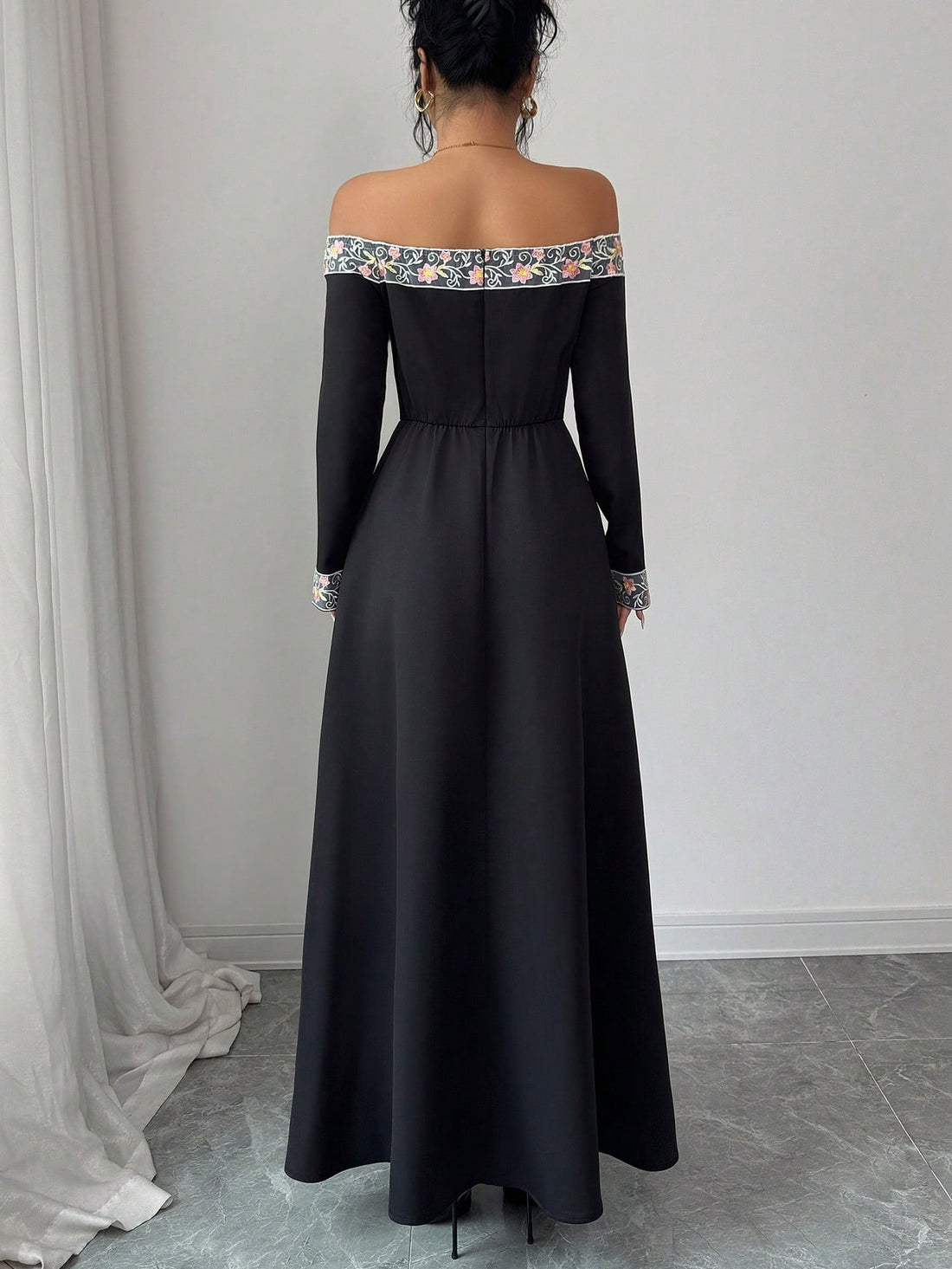Escape to your most stylish self in this charming off-shoulder dress that whispers romance with delicate floral embroidery. The relaxed neckline frames your shoulders beautifully while the intricate details add that perfect touch of elegance without trying too hard. Whether you're strolling through spring gardens or catching autumn breezes on a getaway, this versatile piece transitions effortlessly from day adventures to evening moments. Comfortable, flattering, and undeniably Instagram-worthy—your vacation