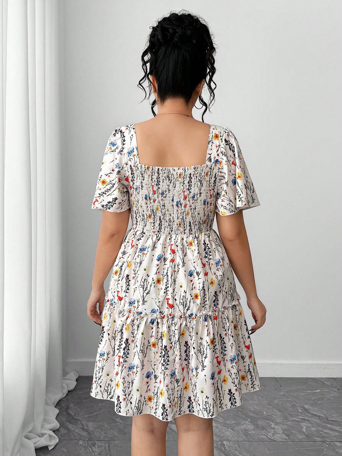 Slip into effortless elegance with this plus-size babydoll midi dress that celebrates your curves in all the right ways. The cinched waist creates a flattering silhouette while the relaxed babydoll bodice offers comfort and movement. Perfect for date nights, brunch dates, or whenever you want to feel fabulous without trying too hard. The midi length strikes that sweet spot between sophisticated and fun, making it a versatile wardrobe essential that works from day to evening. Dress it up with heels or keep i