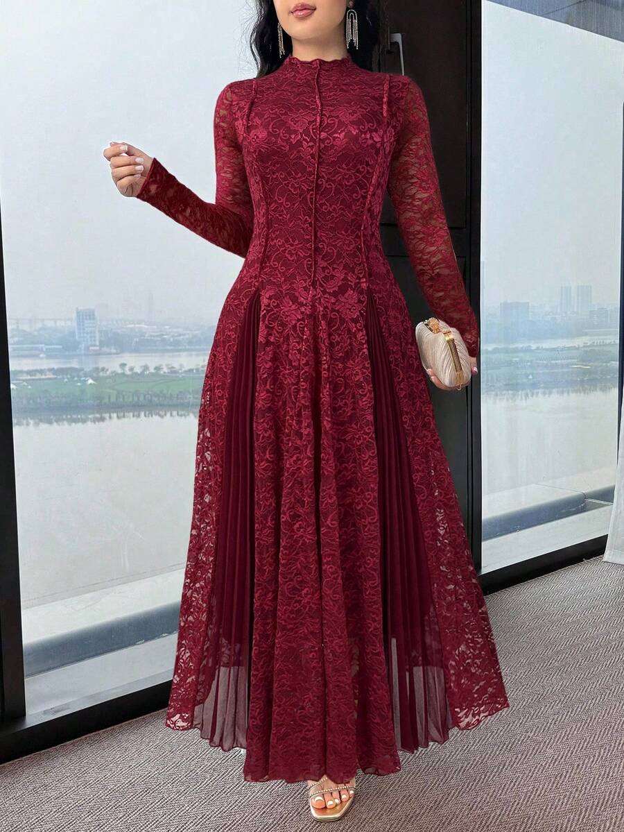 Burgundy floral lace maxi dress front view with sheer long sleeves and pleated side panels