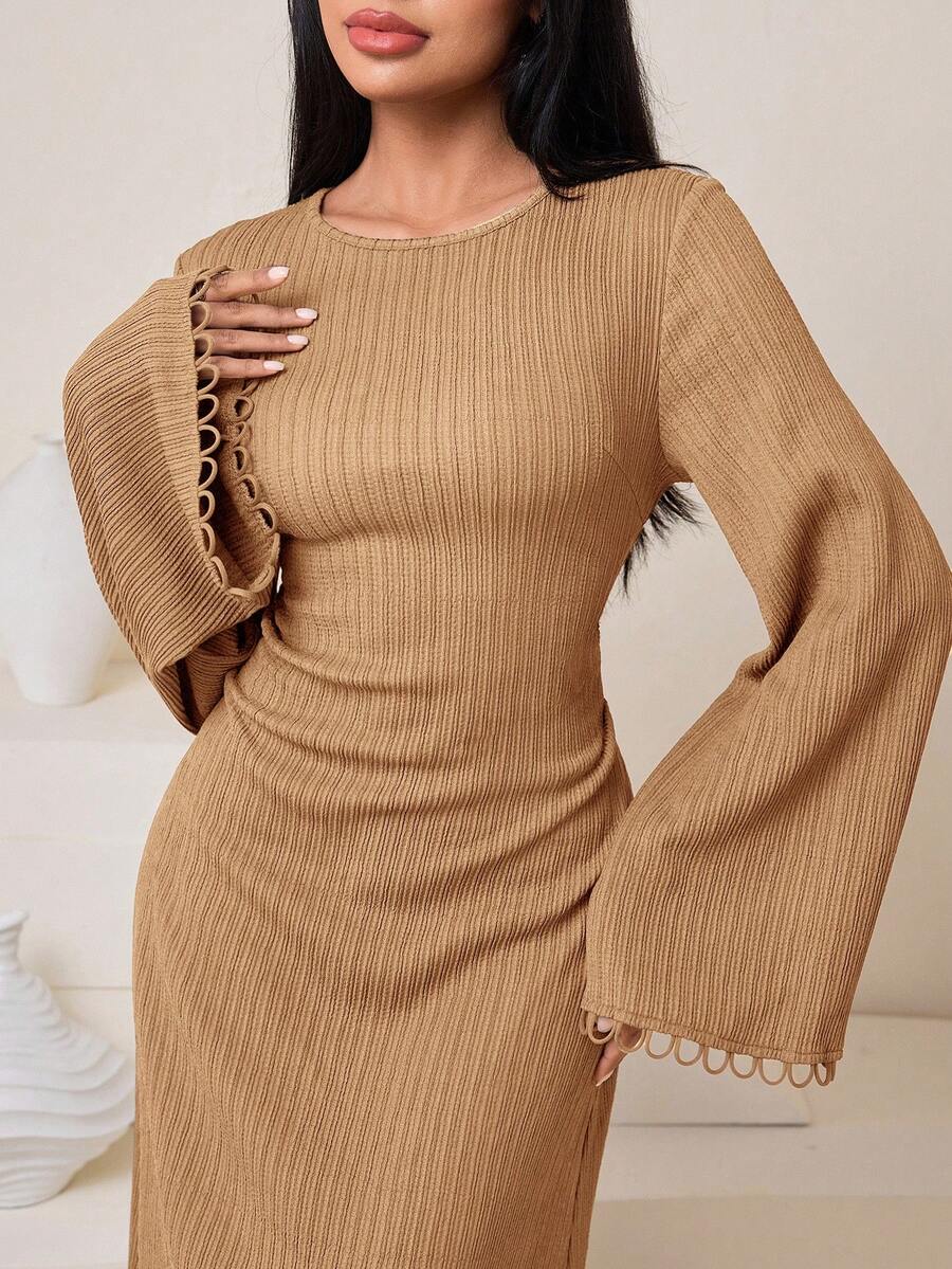 Elevate your everyday wardrobe with this charming midi dress that strikes the perfect balance between polished and fun. The cinched tie-front waist creates a flattering silhouette while the fluttery flare sleeves add a touch of whimsy to your look. Whether you're heading to brunch, running errands, or meeting friends for coffee, this versatile piece transitions seamlessly from day to night. The midi length offers timeless elegance with just enough personality to keep things interesting. Perfect for anyone w