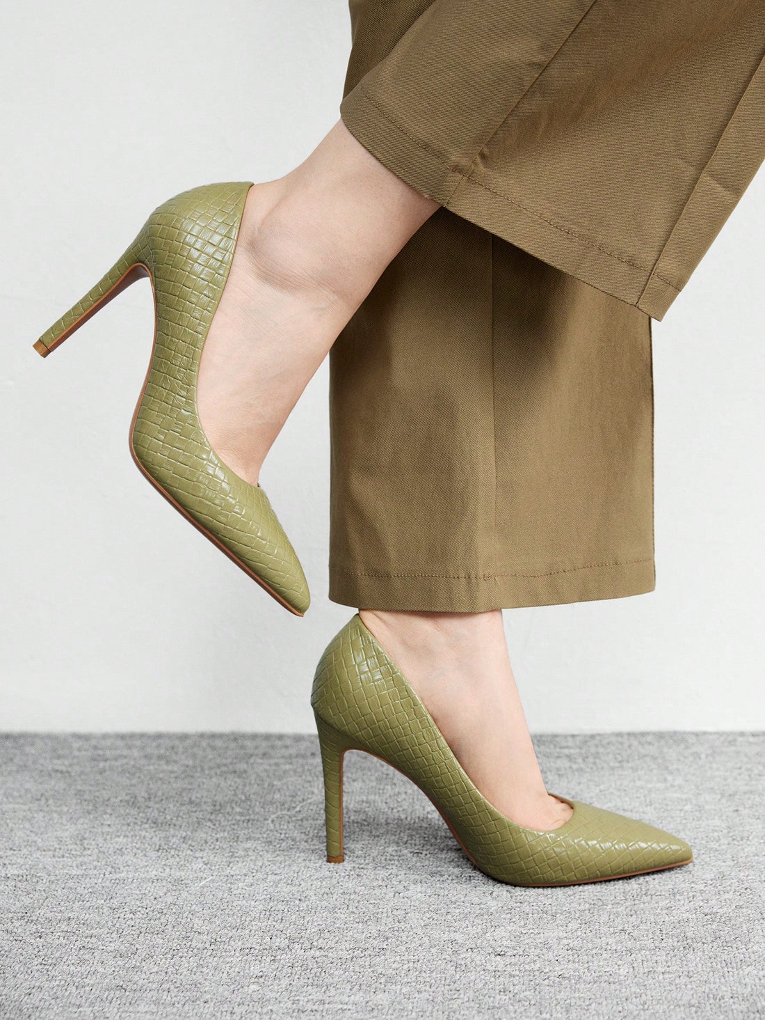 Step into sophistication with these stunning pointed-toe high heels! Crafted in a timeless solid color, they're the ultimate everyday essential that transitions seamlessly from office to evening plans. The sleek silhouette elongates your legs while the classic design pairs effortlessly with any outfit in your wardrobe. Whether you're conquering your commute or heading out for something special, these heels deliver instant polish and confidence. Comfortable enough for all-day wear, they're your new go-to for