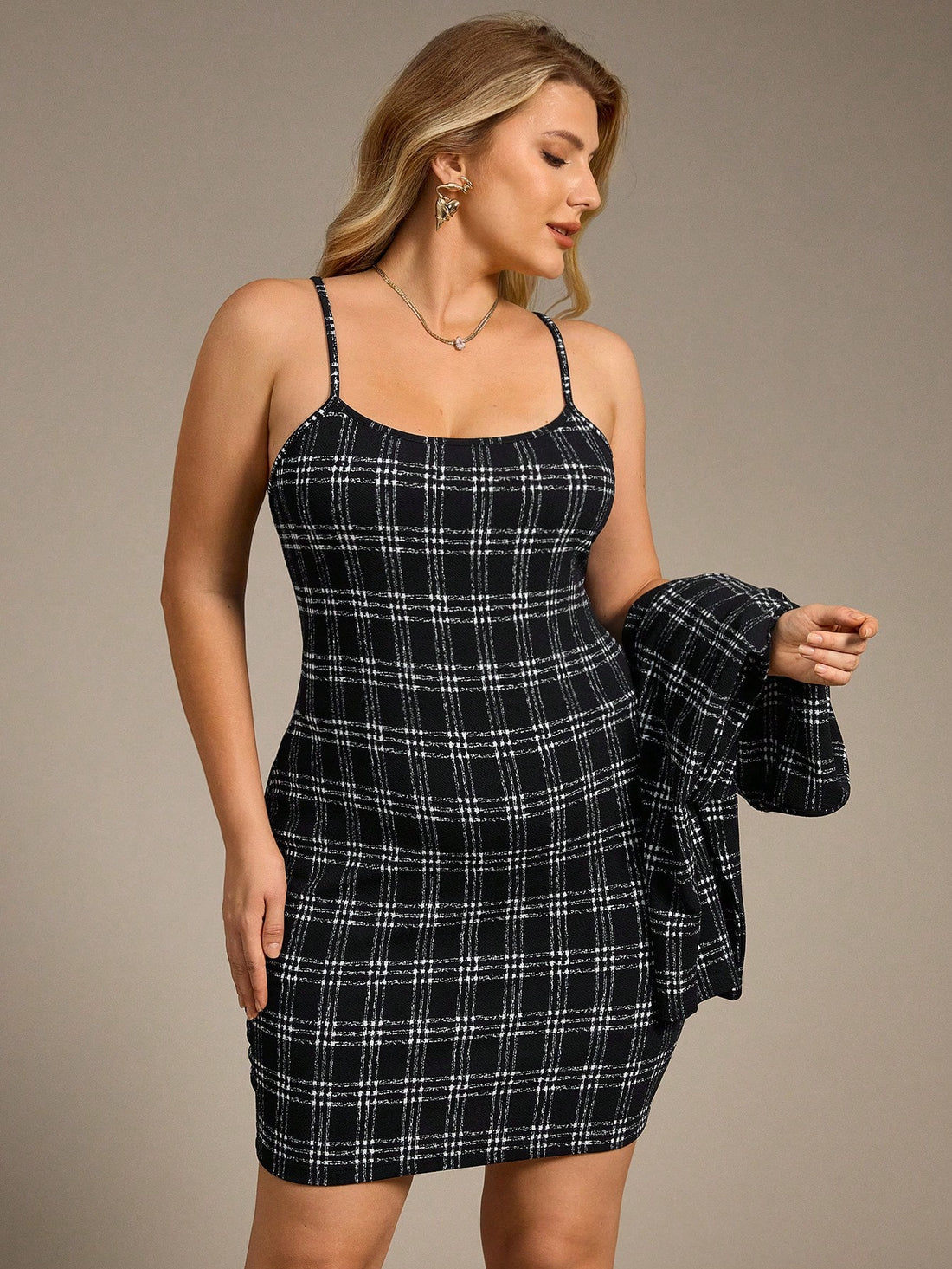 Rock a bold, vintage-inspired look with this chic 2-piece set! The cropped jacket features a timeless plaid digital print that pairs perfectly with the fitted bodycon mini dress, creating an effortlessly stylish silhouette. Whether you're heading to the office or hitting the town for a night out, this versatile duo transitions seamlessly from work to weekend. The structured jacket adds polish and edge, while the sleek dress keeps things modern and fun. Mix, match, or wear together—this set is your new go-to