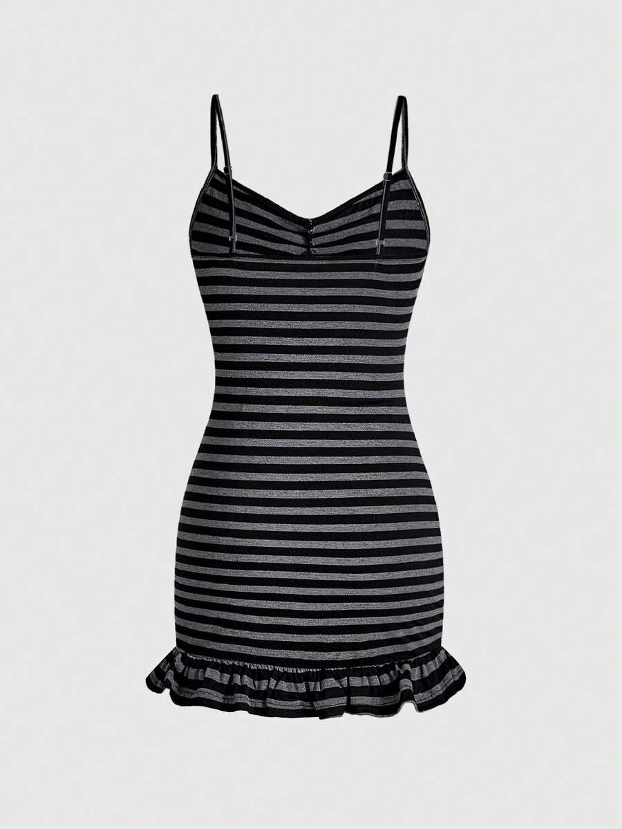 Effortless style meets timeless appeal with this chic striped mini dress. Delicate spaghetti straps frame the shoulders while the flattering striped print adds visual interest and dimension. Perfect for casual outings, weekend brunches, or layered styling, this versatile piece transitions seamlessly from day to night. The mini length offers a modern, playful silhouette that flatters various body types. Lightweight and comfortable, it's an essential addition to any wardrobe.