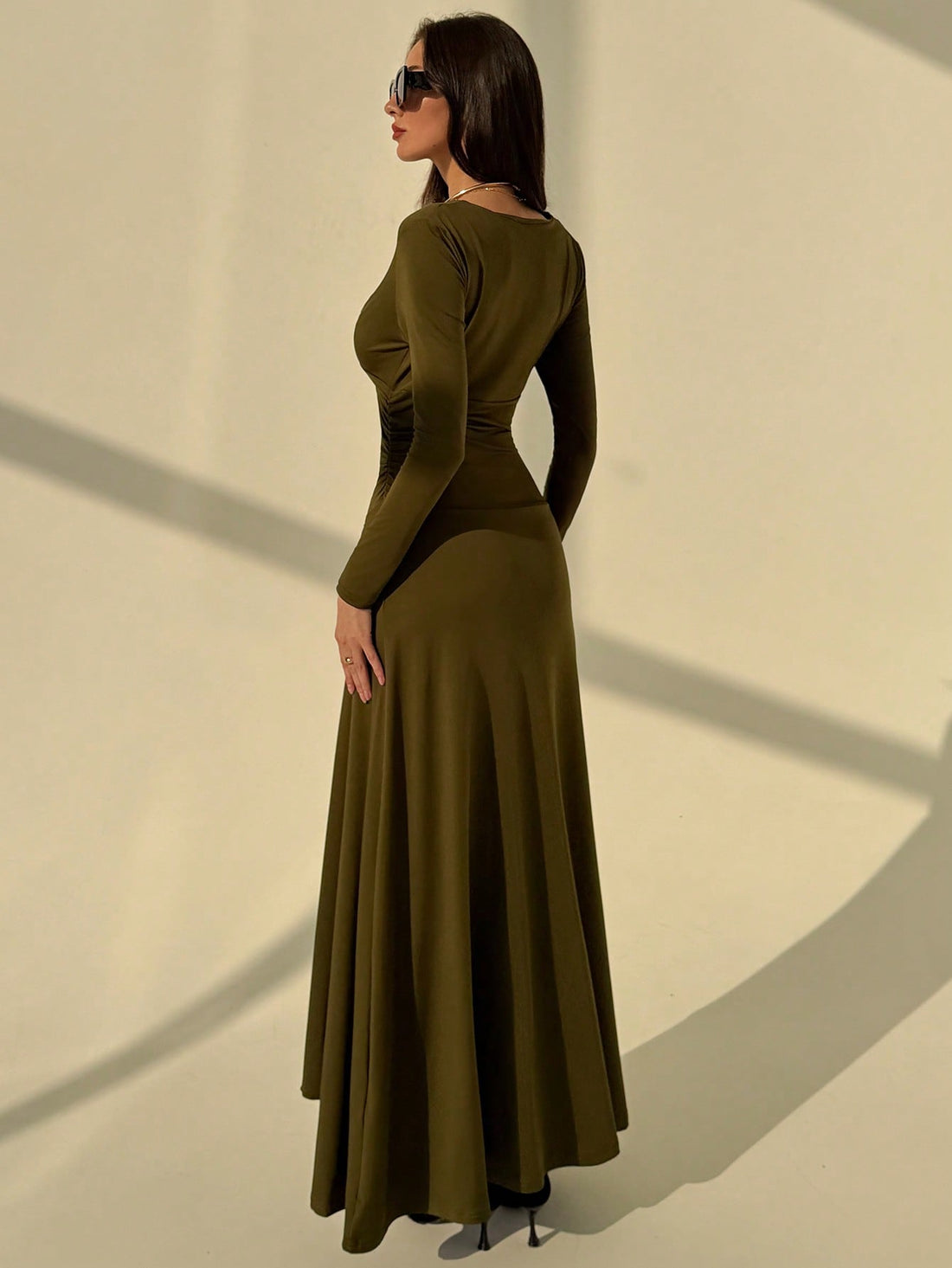 Make a statement in this stunning extra-long V-neck dress that's practically begging for a red carpet moment! The flowing ribbon design dances gracefully with every step, while shimmering metallic embellishments catch the light and steal the show. Whether you're walking down the aisle, celebrating at a gala, or turning heads at an evening soirée, this elegant piece delivers sophistication with a touch of sparkle. The flattering V-neckline and floor-sweeping silhouette create an effortlessly chic look that w