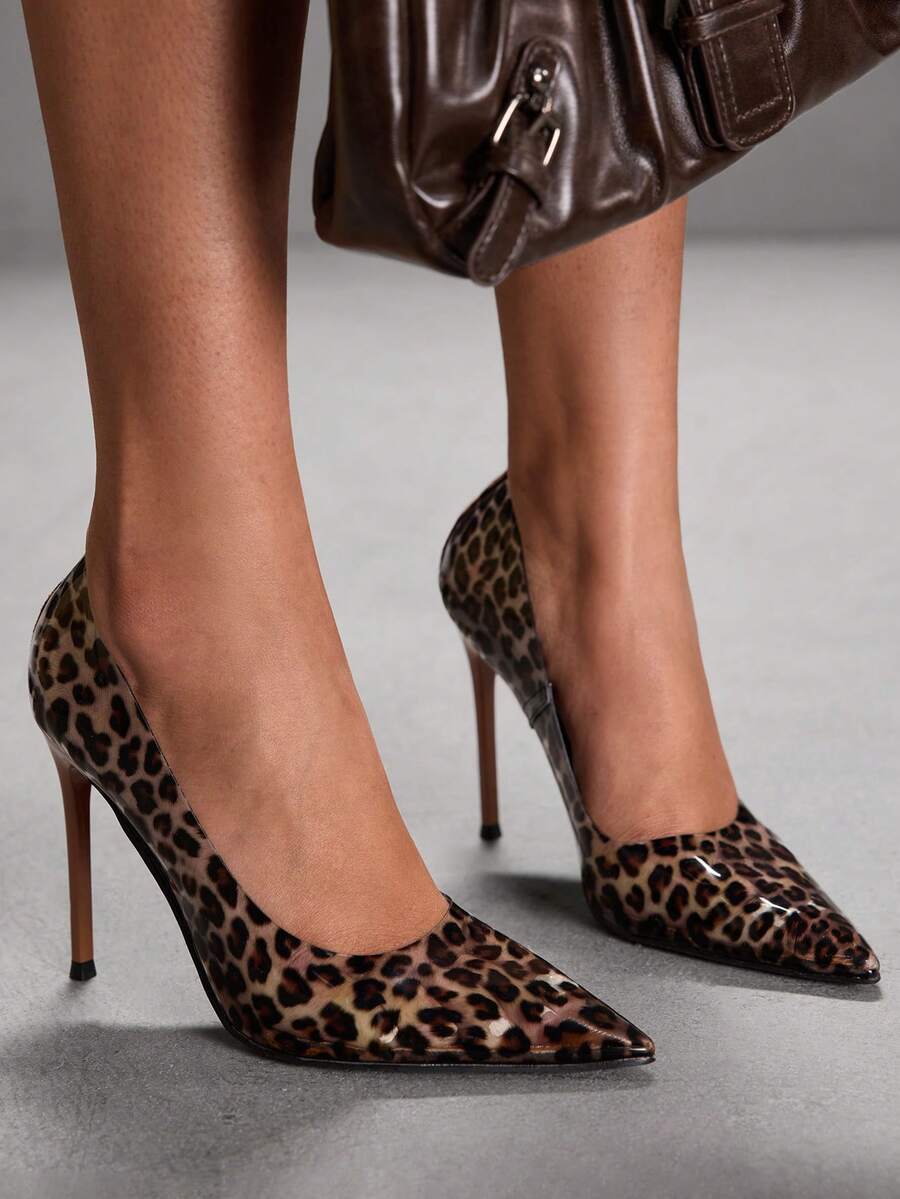 Step into the spotlight with these stunning fuchsia pointed-toe pumps that blend bold color with modern transparency. The sleek silhouette elongates your legs while the eye-catching hue commands attention at any event. Whether you're celebrating Valentine's Day, hitting the dance floor, or turning heads on a night out, these high heels deliver instant glamour and confidence. The transparent design adds an unexpected edge to your party look, making them the perfect statement piece for fashion-forward women w