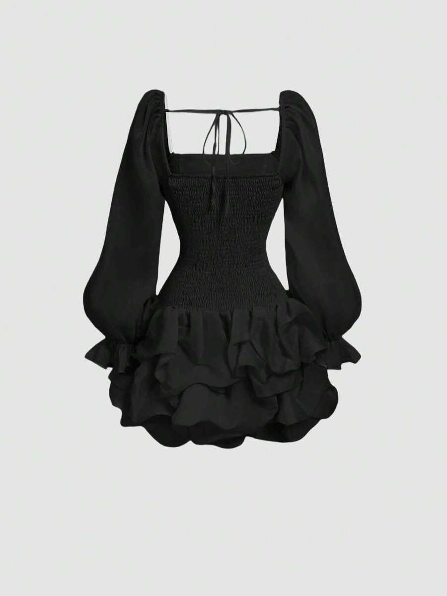 This sophisticated black mini dress combines contemporary design with timeless elegance. The fitted silhouette is enhanced by strategic ruching that creates flattering dimension, while the distinctive bubble hem adds a playful yet polished finish. Crafted for those who appreciate refined style, this dress transitions seamlessly from romantic occasions to celebratory events. The sleek black palette pairs effortlessly with any accessory, making it a versatile addition to your wardrobe. Whether you're marking 