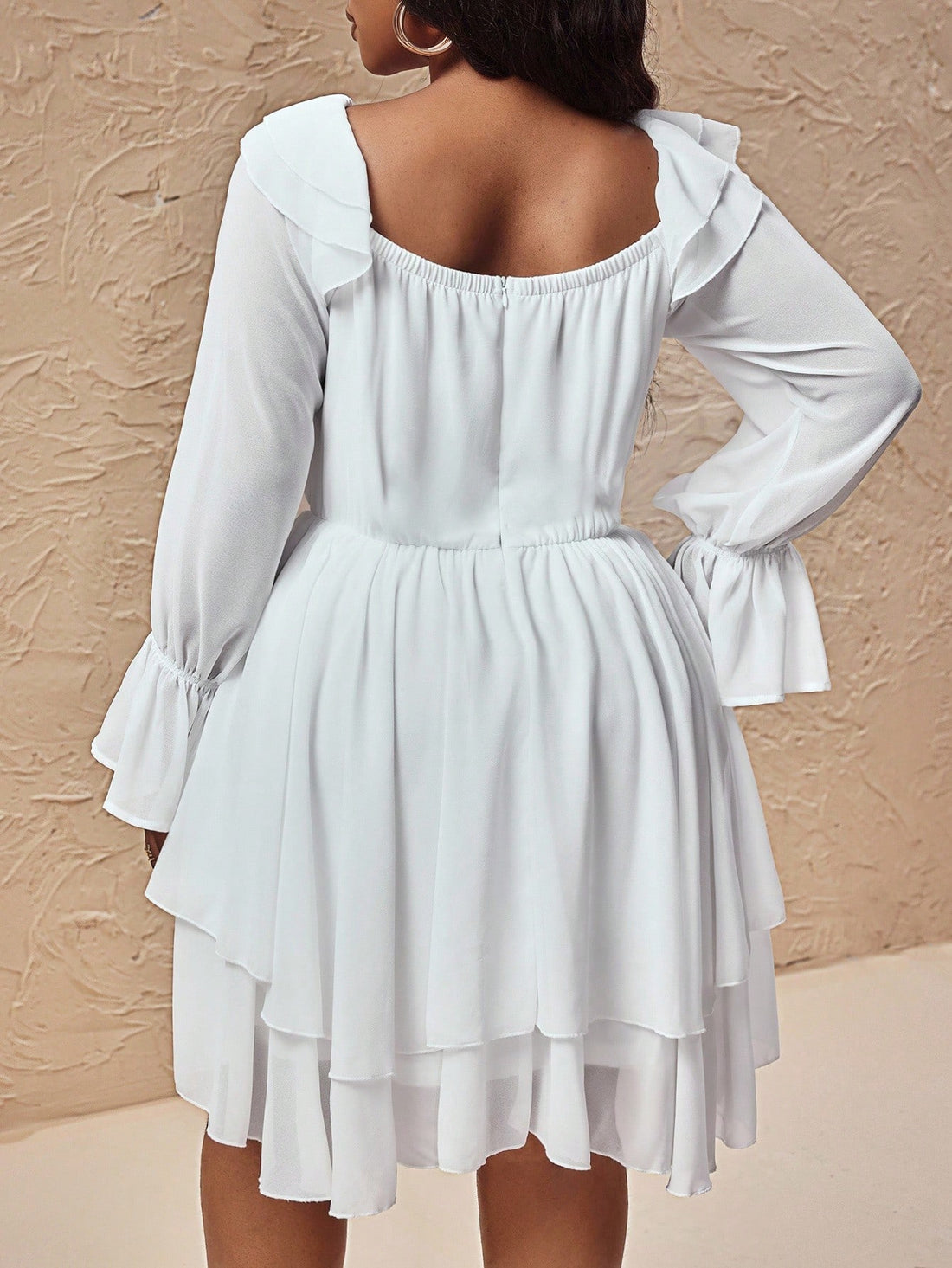 Elevate your seasonal wardrobe with this show-stopping plus-size dress that's equal parts sophisticated and fun! The charming ruffle collar adds a touch of vintage-inspired elegance, while adjustable tie-up details at the sleeves let you customize your look. Flowy flare sleeves create a flattering silhouette that moves beautifully, perfect for everything from cozy coffee dates to festive gatherings. Crafted for comfort and confidence, this dress transitions seamlessly from autumn into winter, making it your