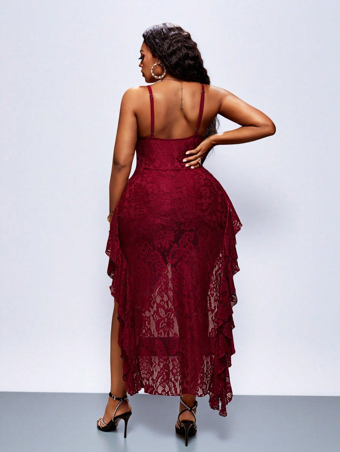 Celebrate the season in style with this stunning plus-size mini dress, thoughtfully designed to flatter pear-shaped figures. The delicate elastic lace cami creates an elegant silhouette while the fitted bodice provides support where you need it most. Perfect for holiday parties, festive gatherings, or any occasion calling for a touch of glamour. The mini length offers a modern, playful vibe that's both sophisticated and fun. Slip into confidence this Christmas and turn heads in a dress that makes you feel a