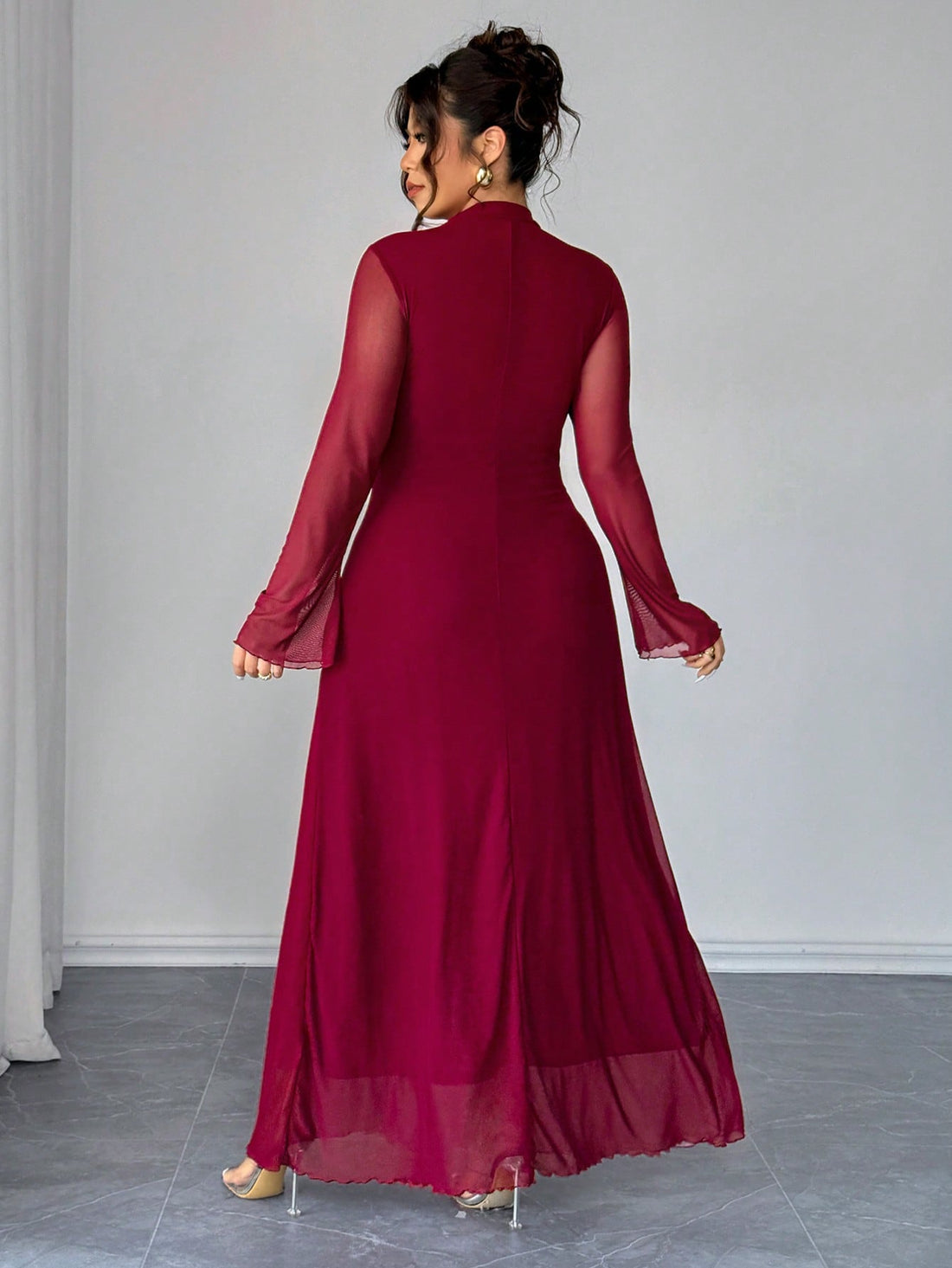 Ring in the New Year with timeless elegance! This stunning wine red mesh dress features delicate floral embroidery that catches the light beautifully. The long sleeves provide graceful coverage while the flowing silhouette flatters every curve. Perfect for celebrations, holiday parties, or any occasion calling for sophisticated style. Designed for plus-size figures, this dress combines comfort with show-stopping glamour—because you deserve to feel absolutely fabulous!