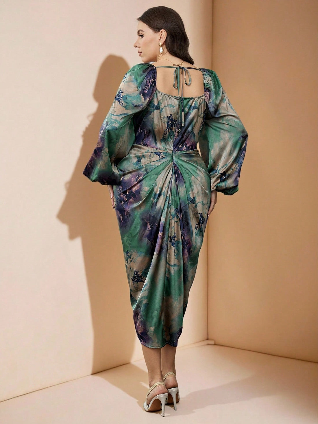 Elevate your wardrobe with this stunning tie-dye dress that celebrates bold color and effortless style. The ruffled neckline adds a touch of romance, while voluminous lantern sleeves create a flattering silhouette that moves beautifully. Crafted for plus-size figures, this piece offers comfort without compromising on chic appeal. Perfect for making a statement at brunches, date nights, or whenever you want to feel fabulous and fashion-forward. Embrace your curves and express your unique personality in this 