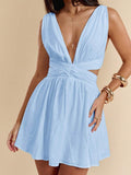 Light blue sleeveless mini dress with V neckline twist waist and side cutouts