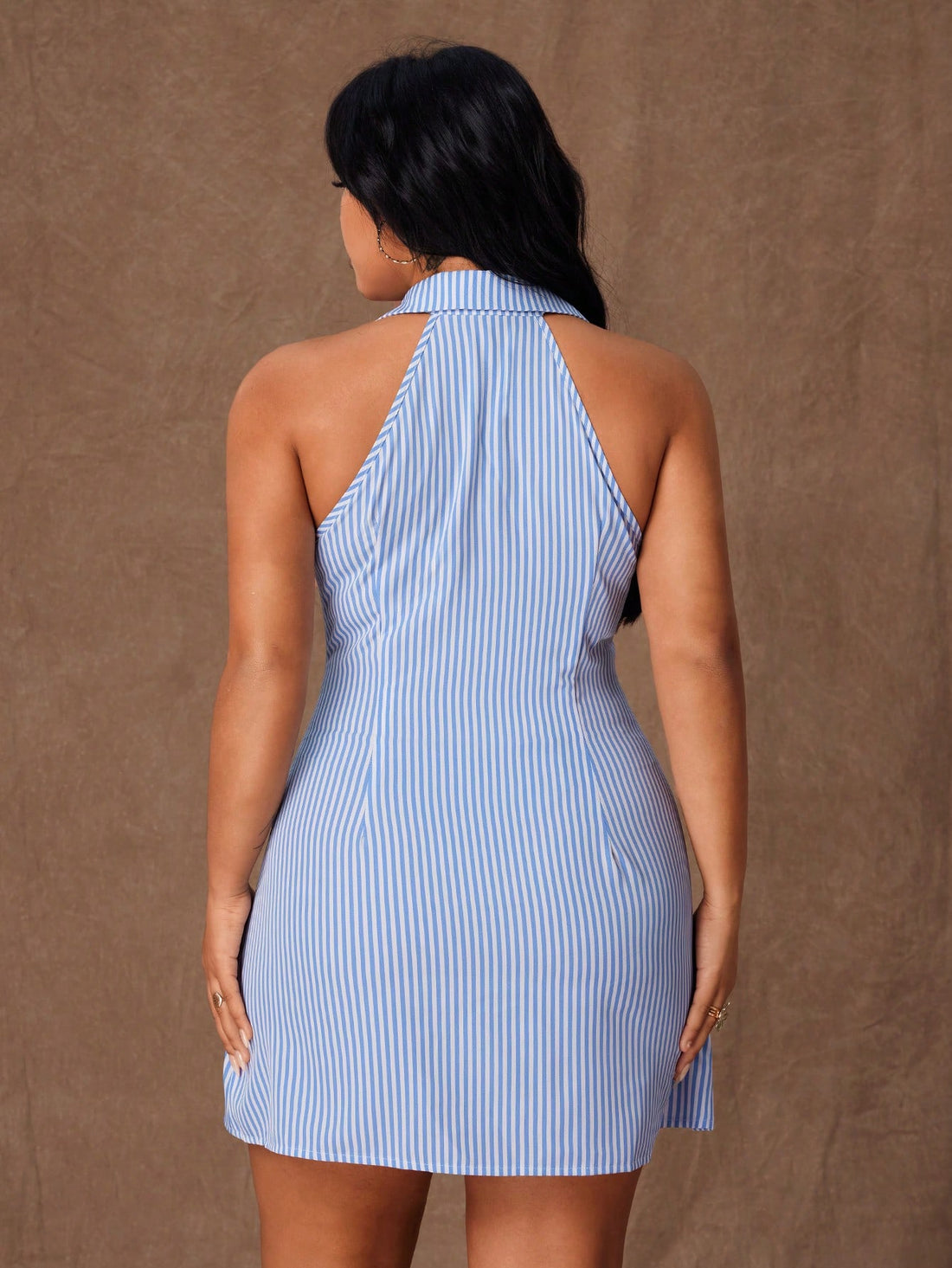 Effortlessly chic and undeniably comfortable, this striped sleeveless dress is your new go-to for casual days. The relaxed fit flatters beautifully while the classic stripe pattern keeps things timeless, and those charming button details add just the right touch of personality. Perfect for pairing with sneakers, sandals, or your favorite jacket—this versatile piece transitions seamlessly from weekend errands to laid-back hangouts. Celebrate your style in a dress that feels as good as it looks.