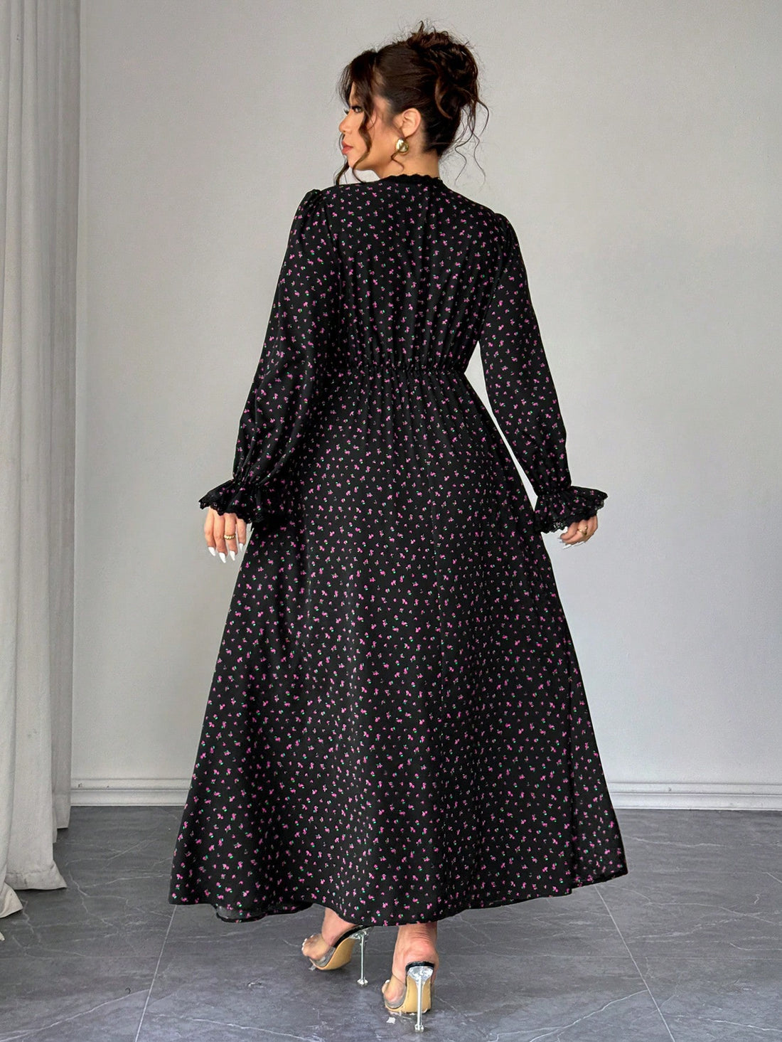 Bloom into elegance with this stunning plus-size maxi dress, where delicate floral prints dance across flowing fabric. The romantic V-neckline flatters your silhouette while intricate lace trim adds a touch of timeless sophistication. Perfect for spring weddings, garden parties, or any occasion calling for effortless glamour, this dress celebrates your curves with confidence and style. Slip it on and let the compliments roll in!