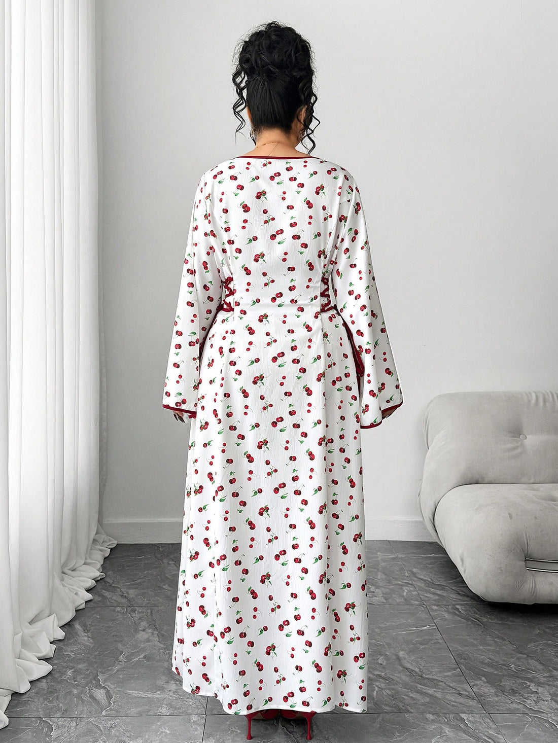 Elevate your wardrobe with this playful plus-size dress that's equal parts fun and fabulous! Featuring a charming cherry print paired with bold color blocking, this piece brings personality to your everyday style. The tie-up detail at the waist creates a flattering silhouette while the button accents add a touch of sophistication. Perfect for brunch dates, casual outings, or whenever you want to feel confident and chic. Comfort meets style in a dress designed to celebrate your curves and your unique flair.