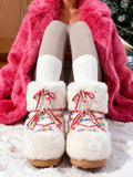 Front view of Cozy Chic: Women's Winter Faux Fur Snow Boots with Chunky Heel and Lace-Up Design for punk motorcycle boot styling