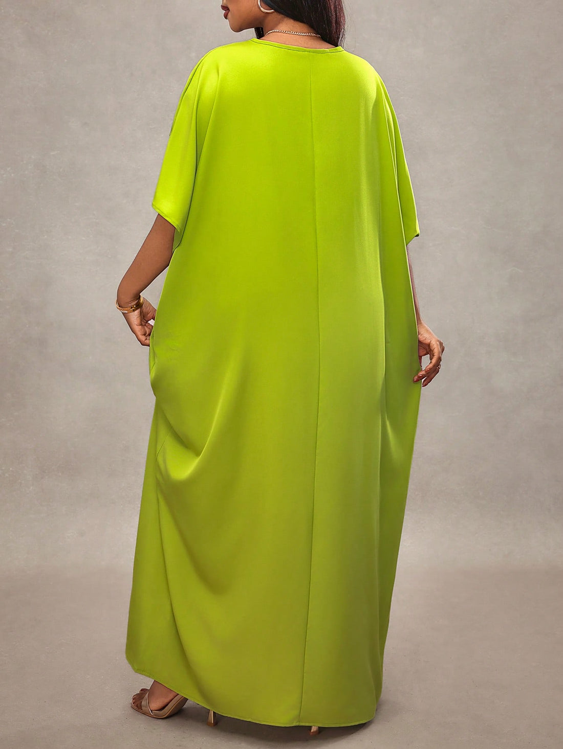 Make a statement in this vibrant fluorescent green dress that's as bold as you are! Designed for plus-size figures, this loose-drape beauty features comfortable short sleeves perfect for any occasion—from bridal showers to beach getaways. The relaxed fit flatters your silhouette while keeping you cool and confident. Whether you're celebrating a special moment or soaking up the sun, this eye-catching piece ensures you'll turn heads and feel fabulous doing it. Your next favorite outfit is here!