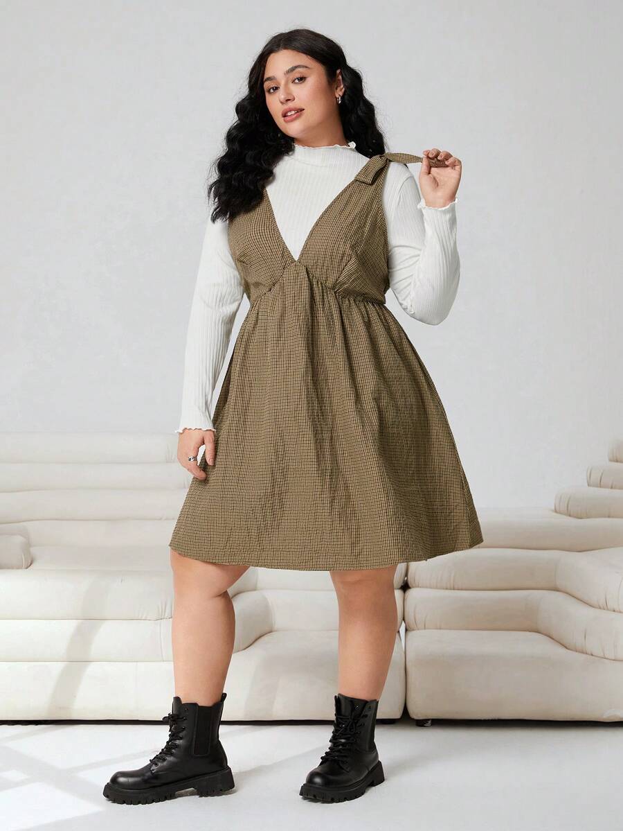 Experience the breathtaking fusion of heritage patterns and sharp, modern architectural tailoring. This stunning merlot plaid ensemble is meticulously designed for the woman who values a high-fashion, "quiet luxury" approach to seasonal dressing—the ultimate centerpiece for prestigious weekend retreats, exclusive city soirées, and high-authority casual outings.