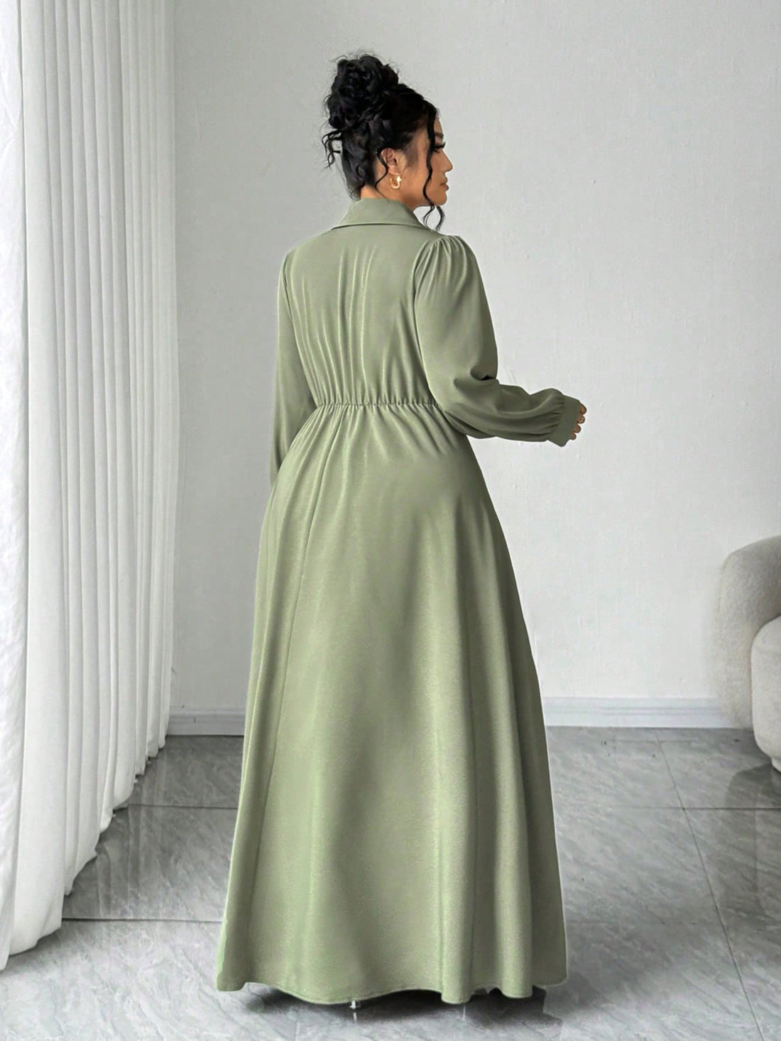 Elevate your wardrobe with this gorgeous green A-line maxi dress that's as versatile as it is fabulous! The flattering silhouette skims beautifully over curves, while charming button details add a touch of personality to every wear. Whether you're heading to brunch, a wedding, or a night out, this dress delivers effortless style and comfort. The flowing maxi length keeps things elegant and timeless, making it the perfect go-to piece for any occasion. Slip it on and feel confident, chic, and ready to turn he