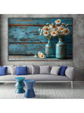 Living room view of daisy and blue vase wall art above gray sofa