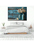 Bedroom view of rustic daisy canvas print above white bed