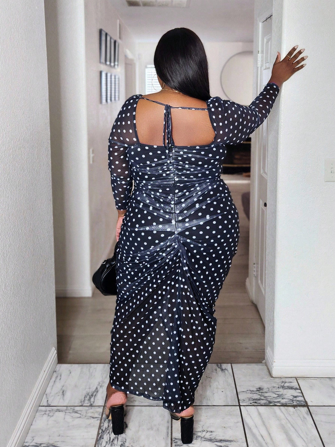 Twirl into the season with effortless charm! This elegant plus-size dress features delicate ruffles along the long sleeves and a timeless polka dot print that works beautifully for autumn gatherings, winter celebrations, or any special occasion. The flattering silhouette and flowing fabric create a look that's both sophisticated and fun. Whether you're heading to a holiday party or a casual brunch, this versatile dress brings personality and polish to your wardrobe.