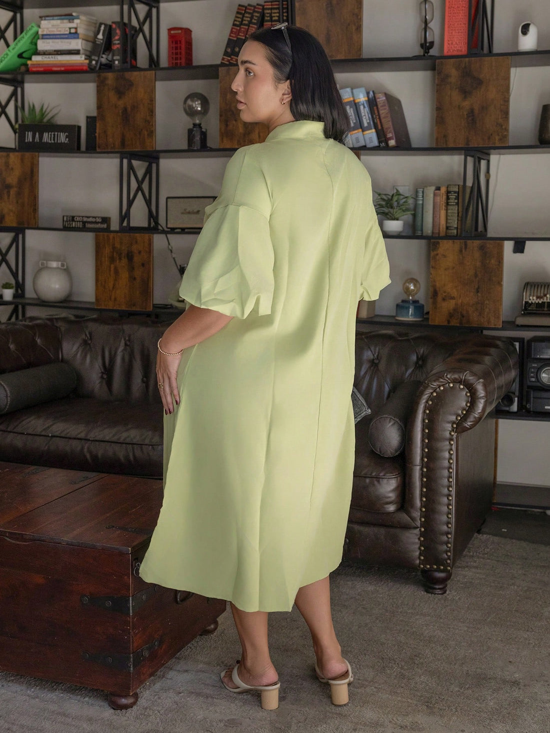 Designed with curves in mind, this charming summer dress celebrates your silhouette with a flattering loose fit that skims beautifully over the hips and thighs. The romantic lantern sleeves add a whimsical touch while the structured stand collar frames your neckline with understated elegance. Perfect for warm-weather adventures, from casual brunches to garden parties, this plus-size piece combines comfort with timeless style. Slip it on and feel fabulous all season long!