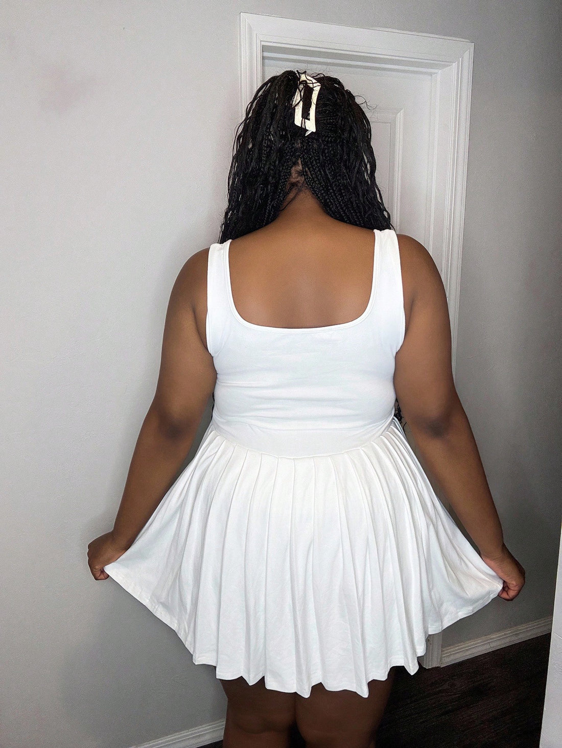 Embrace your curves with this charming two-piece set designed specifically for pear-shaped silhouettes! The fitted U-neck racer vest cinches at the waist to highlight your best features, while the flowing pleated skirt skims over hips and thighs with effortless grace. Perfect for warm-weather adventures, casual brunches, or weekend getaways, this set combines comfort with flattering style. Mix and match the pieces with your favorite basics, or wear them together for an instantly polished look. Spring and su