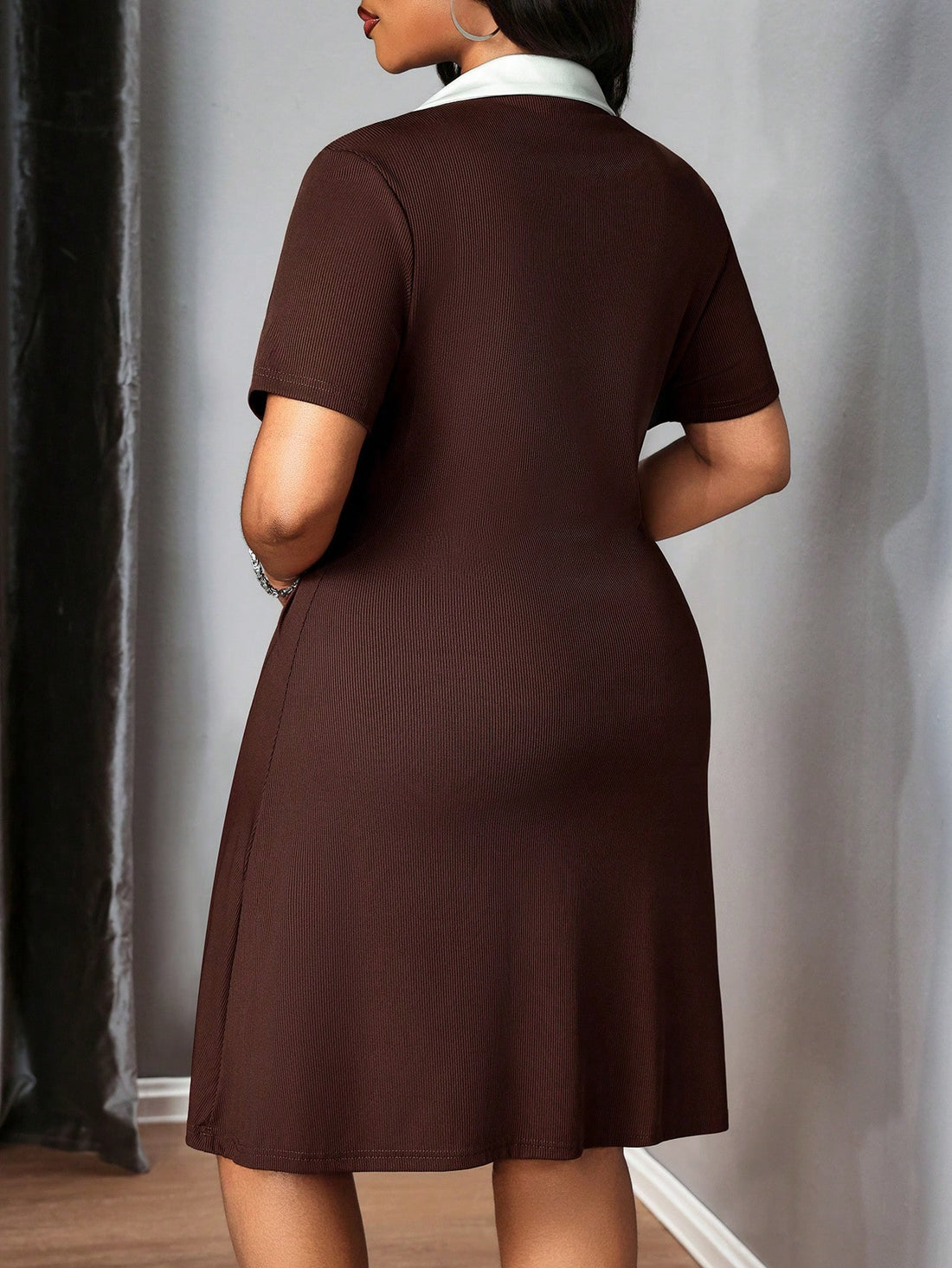 Elevate your wardrobe with this charming plus-size mini dress that effortlessly transitions from beach getaway to office meetings. The crisp contrasting collar adds a preppy twist, while the short sleeves keep you cool and comfortable all season long. Whether you're lounging by the pool or impressing colleagues at a casual lunch, this versatile piece delivers style without the fuss. The flattering cut celebrates your curves while the timeless design ensures you'll reach for it again and again. Summer just g